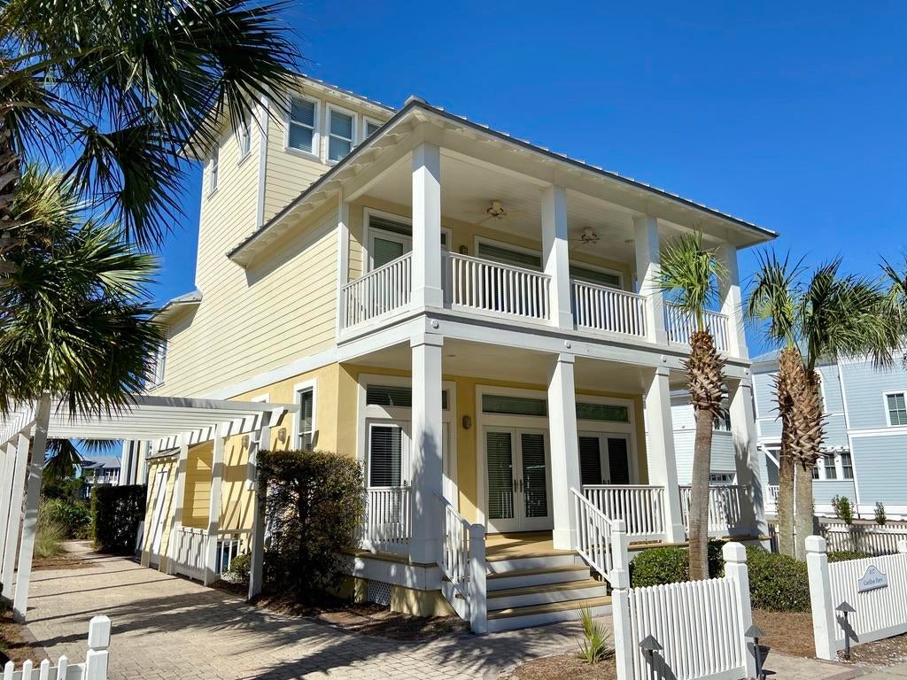 Back on Market.  This spacious lake-front, high-end beach home, steps from the beach walkover to the Gulf of Mexico, is situated in the private, gated luxury community of Carillon Beach. Very few homes situated on Lake Carillon come available on the open market for purchase. The home displays hardwood flooring throughout and offers 3 master suites  (including one on the first floor). A comfortable family room, spacious bedrooms and the tower area will afford your family opportunities to share lasting beach memories. The high-end kitchen features granite countertops and a focal island with built-in gas cook top. The screened in porch off the family room provides a comfortable lake-side space to relax and enjoy inspiring sunsets over Lake Carillon. Carillon Beach is a gated gulf-front community of select homes which offers three community pools, tennis courts, 8 beach walkovers, Lake Carillon and community areas for owners and their guests to enjoy. Carillon's pristine, white sandy beach is never crowded. Should the new owner decide to rent the home, we can provide a rental history and reasonably anticipated seasonal projections going forward.
