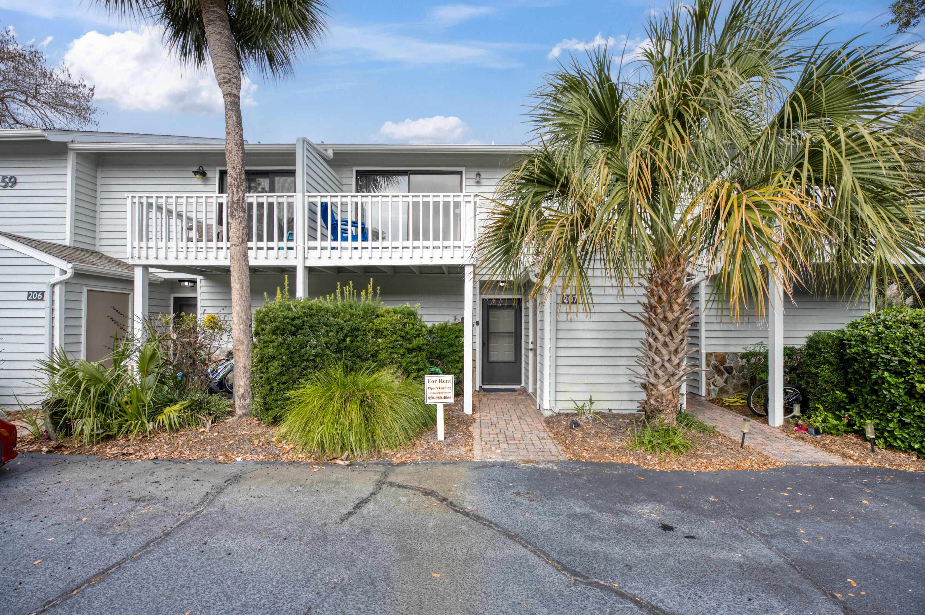 Charming 2-bedroom, 1.5-bath townhouse in Cassine Gardens. Move-in ready and conveniently located near the beach. Nestled in the scenic Cassine Garden community in the center of Seagrove Beach, just a short three-minute walk to the pristine sugar sands of Seagrove. Upon entering the main level, you'll find a fully furnished kitchen, dining area, living space, a half bathroom, and an outdoor patio. Upstairs, there are two bedrooms, each with its own private open porch—perfect for enjoying your morning coffee while taking in the lush green surroundings of Cassine Gardens. The nearest beach access is at One Seagrove Place.