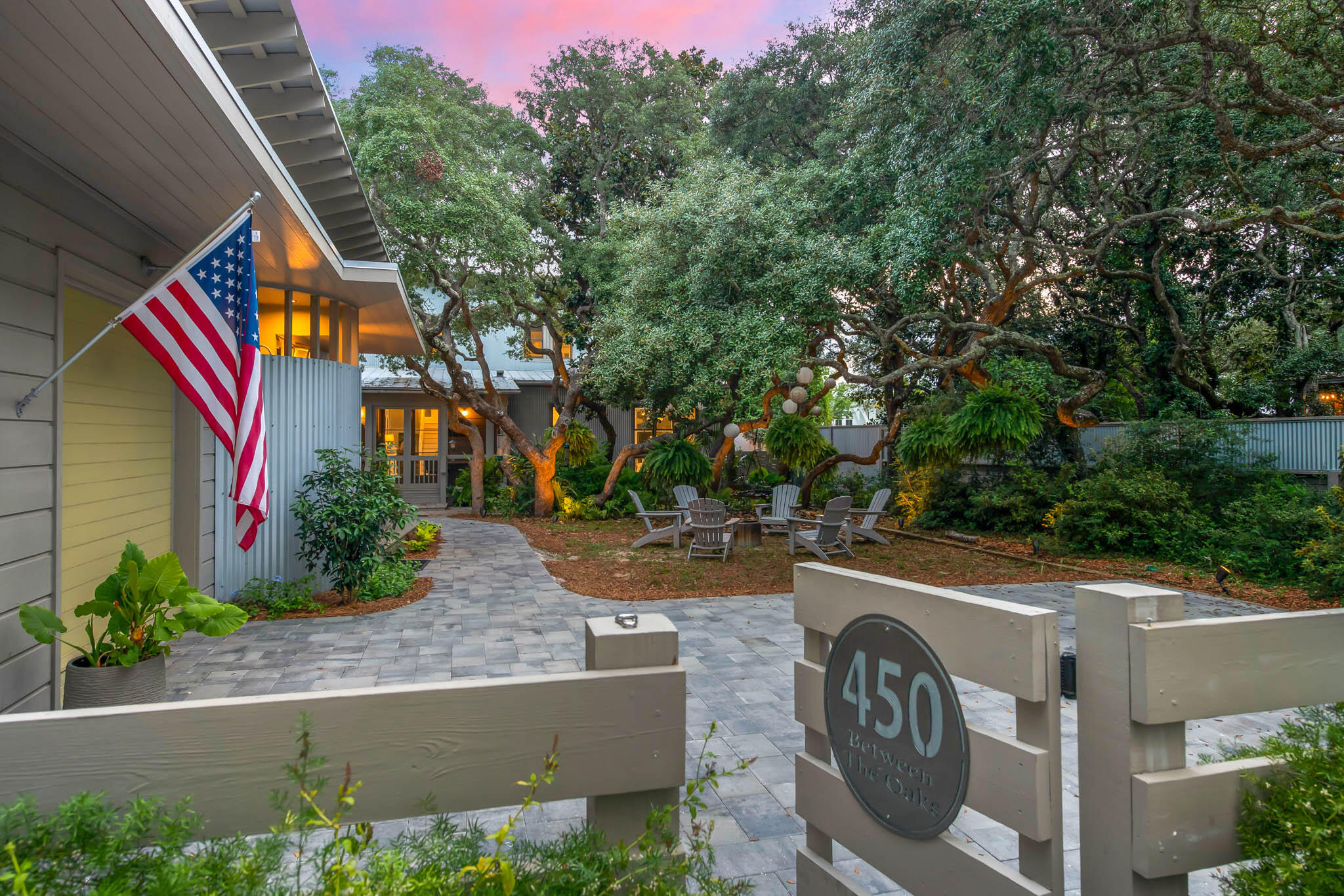 Aptly named ''Between the Oaks,'' this charming beachside bungalow has it all. With a prime location in the heart of downtown Grayton Beach, walk to all your favorite restaurants and your choice of several beach accesses. Situated on a massive oversized lot, the main house and private heated pool are tucked away amongst a grove of mature sand live oak trees. A one-story carriage house and garage is nestled to the side. Designed by Lourdes Reynafarje of Kiara Designs and built in 2017 by Buster Woodruff Construction, the main home features 3 bedrooms and 3.5 bathrooms. The charming garage apartment contains a full kitchen, bedroom, bathroom and bunk nook. The property includes a one-car garage and additional parking for 8 vehicles. The current owners have made several upgrades to the home, including all new brick pavers and landscaping, new covered patio and cooking shed,  fencing and privacy gate, all new tankless natural gas water heaters throughout, new gas pool heater and sand filter, and new washing machines and dryers.