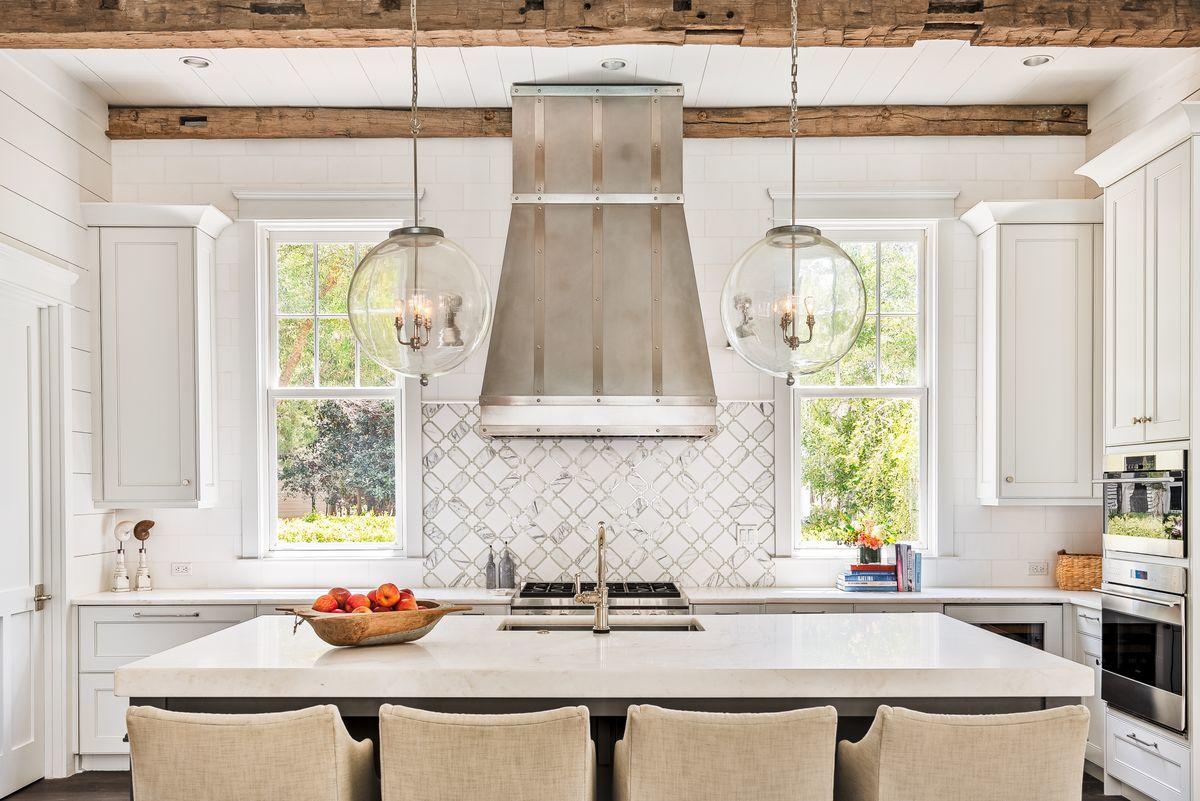 Nestled on a quarter-acre corner lot in the heart of desirable Phase III in WaterColor is a home that provides ample space courtesy of it's impressive scale, while it's breathtaking design and complete privacy offer refined livability. Even in WaterColor, the T.S. Adams-designed 103 Sand Hill Circle is a rarity packed into a 5,843-sq.-ft. Package, highlighted by a truly premier location, overlooking Sand Hill Park and the ever-popular frog pool.

The meticulously cared for and never rented home, offering crisp coastal architecture, features six bedrooms total, with the pronounced master suite on the first floor, four additional suites on the second floor and a private retreat in the carriage house. Nestled on a quarter-acre corner lot in the heart of desirable Phase III in WaterColor is a home that provides ample space courtesy of it's impressive scale, while it's breathtaking design and complete privacy offer refined livability. Even in WaterColor, the T.S. Adams-designed 103 Sand Hill Circle is a rarity packed into a 5,843-sq.-ft. Package, highlighted by a truly premier location, overlooking Sand Hill Park and the ever-popular frog pool.

The meticulously cared for and never rented home, offering crisp coastal architecture, features six bedrooms total, with the pronounced master suite on the first floor, four additional suites on the second floor and a private retreat in the carriage house. Outside, an atypically large pool is positioned to enjoy complete privacy and a spacious courtyard and screened porch seating are designed to maximize year-round outdoor living.

Inside, the first floor was intentionally designed to be clear and airy with 12-ft. Ceilings adorned in reclaimed hand sewn beams. The fully Sub-Zero kitchen, designed by Design Galleria Kitchen & Bath in Atlanta, boasts a butler's pantry, a thick marble island and a nickel range hood. The first-floor owner's suite has a vaulted master ceiling, imported tile and a rainforest shower and freestanding bathtub. A corner office on the main floor provides a serene work from home environment, while a powder bath with custom fixtures and luxurious linen wallpaper add style and appeal.

In addition to four master suites on the second floor, this home's new owners will enjoy a second, larger office space with built-ins and an expansive balcony overlooking Sand Hill Park, and a bunk room with six beds, private televisions and shared bath. Marble countertops are carried throughout the home. The home's third floor presents the perfect respite from a busy day with an expansive entertainment room. The carriage house provides additional accommodations for family or guests.

Decorated with perfect hints of pastels, crisp linens, beadboard and shiplap, this home  complete with Control4 smart home automation and a two-car garage  sits under a tin roof and offers an enviable retreat that is both miles away from the ordinary and steps to all the best that 30A has to offer.