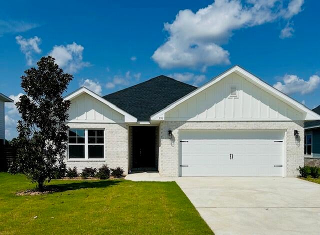 This newly built Craftsman-style home offers relaxed coastal living just 20 minutes from the world-famous beaches of 30A. With 3 bedrooms and 2 baths, the open design features cathedral ceilings and a striking 8' crafted front door that sets the tone upon entry. Enjoy mornings and evenings on the spacious covered patio, and appreciate the ease of LVP flooring throughout. The kitchen and baths shine with quartz countertops, while the primary suite provides a spa-like retreat with a separate garden tub and shower. Thoughtful details such as upgraded Moen faucets, lever-handle hardware, and soft-close drawers complete this inviting home designed for everyday comfort and enjoyment. 
*Some photos have been virtually staged to illustrate the property's potential.*