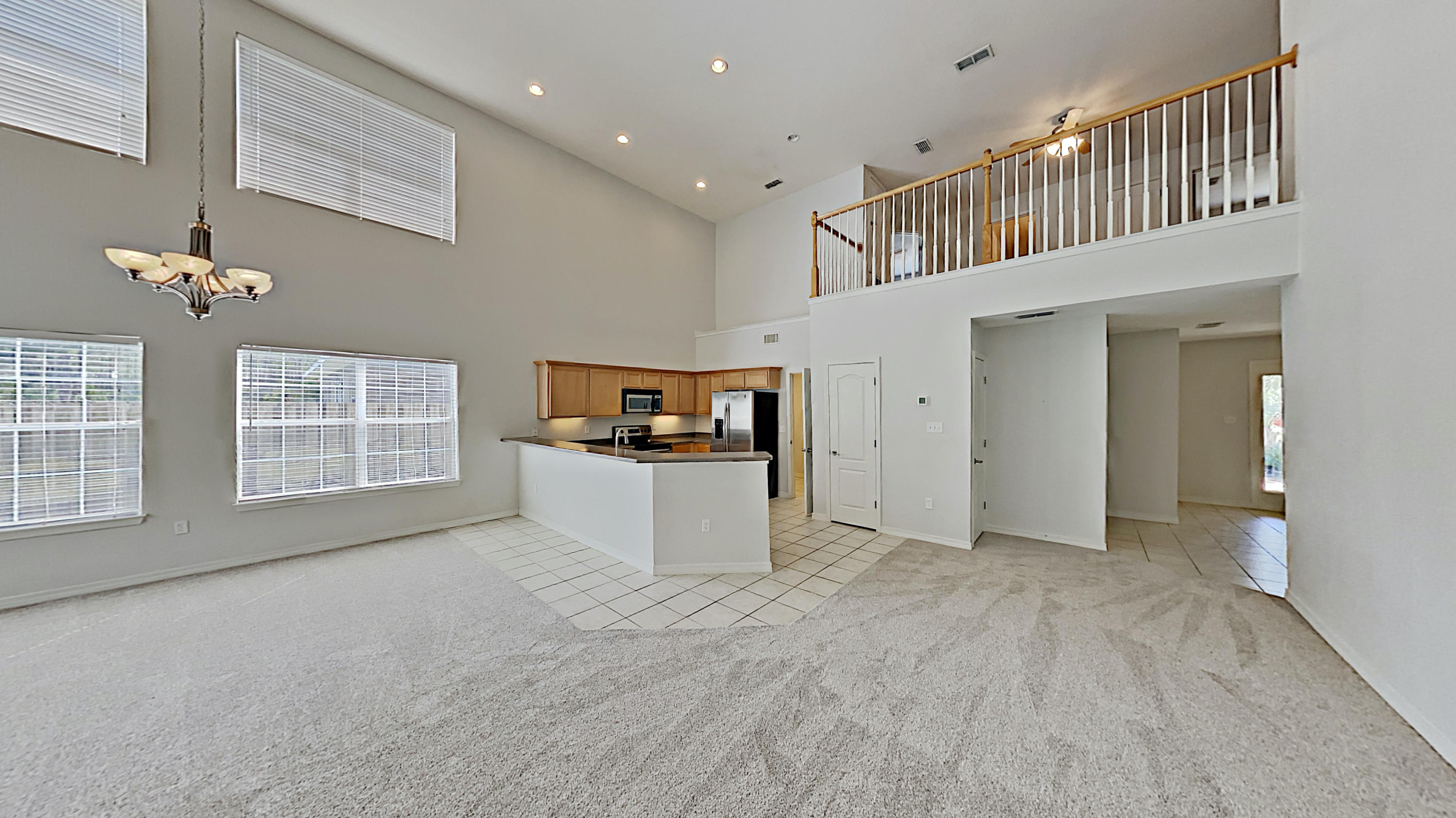 This charming 3 bedroom 2.5 bath house, located in the desirable Driftwood Estates area is available for immediate occupancy.
The open floor plan includes a loft area upstairs that can be used as bonus living space. The kitchen offers ample cabinet space, stainless steel appliances and seating for 4 at the counter. A half bath and the master bedroom finish out the first floor, while the master bath has a separate shower and a jetted tub. Along with the upstairs loft two bedrooms and a shared bath complete the second level. The entire house has fresh paint and landscaping, and the backyard is partially fenced and has a spacious patio. This home provides ample parking with a large driveway and a two car garage. There is a bonus refrigerator in the garages as well for added convenienc