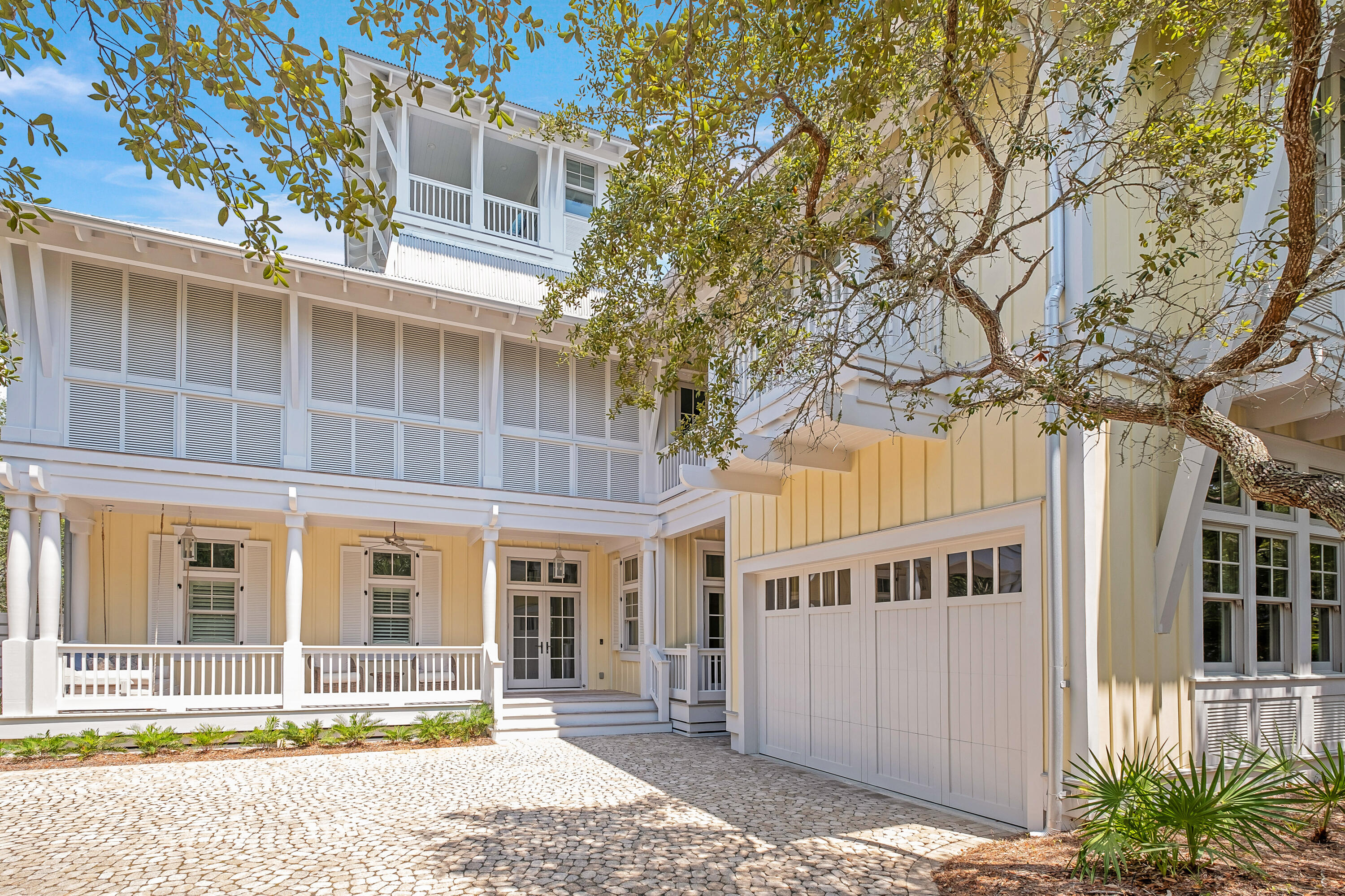This 6 bedroom, 6.5 bath custom built beach home in phase one of Watercolor overlooks serene Western Lake and is just a short walk to the Watercolor boat house, the town center and the Gulf front Watercolor Beach Club allowing you and your family to enjoy Florida living at its best! This home was built by the areas renown Allen Wright, owner of Velvet Sun Builders. The home has a convenient side entrance directly across from the garage and you enter the homes utility area which includes a laundry area, sink, an oversized pantry and wine refrigerator. This area opens into the kitchen and open living space of the first floor. The home has soaring ceilings, shiplap & is light and bright! The kitchen is fit for a chef with white soap stone countertops,  multiple sinks, wolf gas range and hood, multiple dishwasher drawers, ice maker, paneled refrigerator,  beverage refrigerator, microwave, convection oven, counter to ceiling tile and designer lighting. The open floor plan flows into the dining area living area. The living area has a huge wrap around screened porch with an outdoor kitchen and multiple seating areas.  The living area offers two alfresco doors that open completely allowing the indoor and outdoor areas to flow seamlessly! The first floor has a gorgeous master bedroom that overlooks the property's private pool and outdoor fireplace area that can be accessed by walking over one of two bridges over the pool!  The master bedroom has a large walk in closet and ensuite bath that offers a water closet, dual vanities, freestanding soaking tub and a separate walk in shower. A powder bath completes the first floor.  Take the stairs or the elevator to the second floor. This floor offers a second living area, two bunk-rooms (with full size bunk beds) both with their own private ensuite bath, and one additional guest bedroom with two queen bed, ensuite bath and  access to a large screened porch again with multiple sitting areas and a ping pong table. The second floor also offers a second master bedroom with walk in closet and ensuite master bath with water closet, dual vanities, stand alone soaker tub and seperate walk in shower. The second floor offers a sleeping porch which is screened and shuttered and offers two swing beds. There is a second laundry room for this floor. The carriage house which has its own entry from the main house and is above the 2 car garage can be accessed from the second floor as well. The carriage house house is well appointed with a full gas range, microwave, sink, dishwasher and mini frig, counter kitchen seating, seating area with tv, balcony, bedroom and full bathroom. The third floor offers a tv area, office and large storage areas. The 4th floor of the property offers a tower with seating overlooking Western Lake! The home has a great layout and was made to make family memories and entertain guests alike! This property is located in the resort community of Watercolor and includes residential homes an a award-winning beach side resort located on the beautiful Gulf of Mexico beaches and alongside serene Western Lake. The community is designed to have a small town feel and is perfect for exploring on foot or by bike. Quaint streets and pathways connect homes to the community's park, lush green spaces and shops. Residents have access to both tennis and pickle ball courts and a pro shop with tennis gear. Private lessons, group clinics and other activities are available throughout the year. The community also includes access to a boathouse with paddle boards, kayaks and fishing equipment; an outdoor amphitheater, a lakeside pool and a bike barn, Watercolor is home to 9 community pools, including three at the beach club and three at camp watercolor offers a lazy river, a waterslide, basketball courts and a playground. Throughout Watercolor you will find 5 miles of hiking and biking trails, multiple park areas and several docks that are great to let the kids fish in. Resort living at its finest! This home is being sold fully furnished less some exclusions. This home has never been on the rental market and is a must see! Call to schedule a showing today!