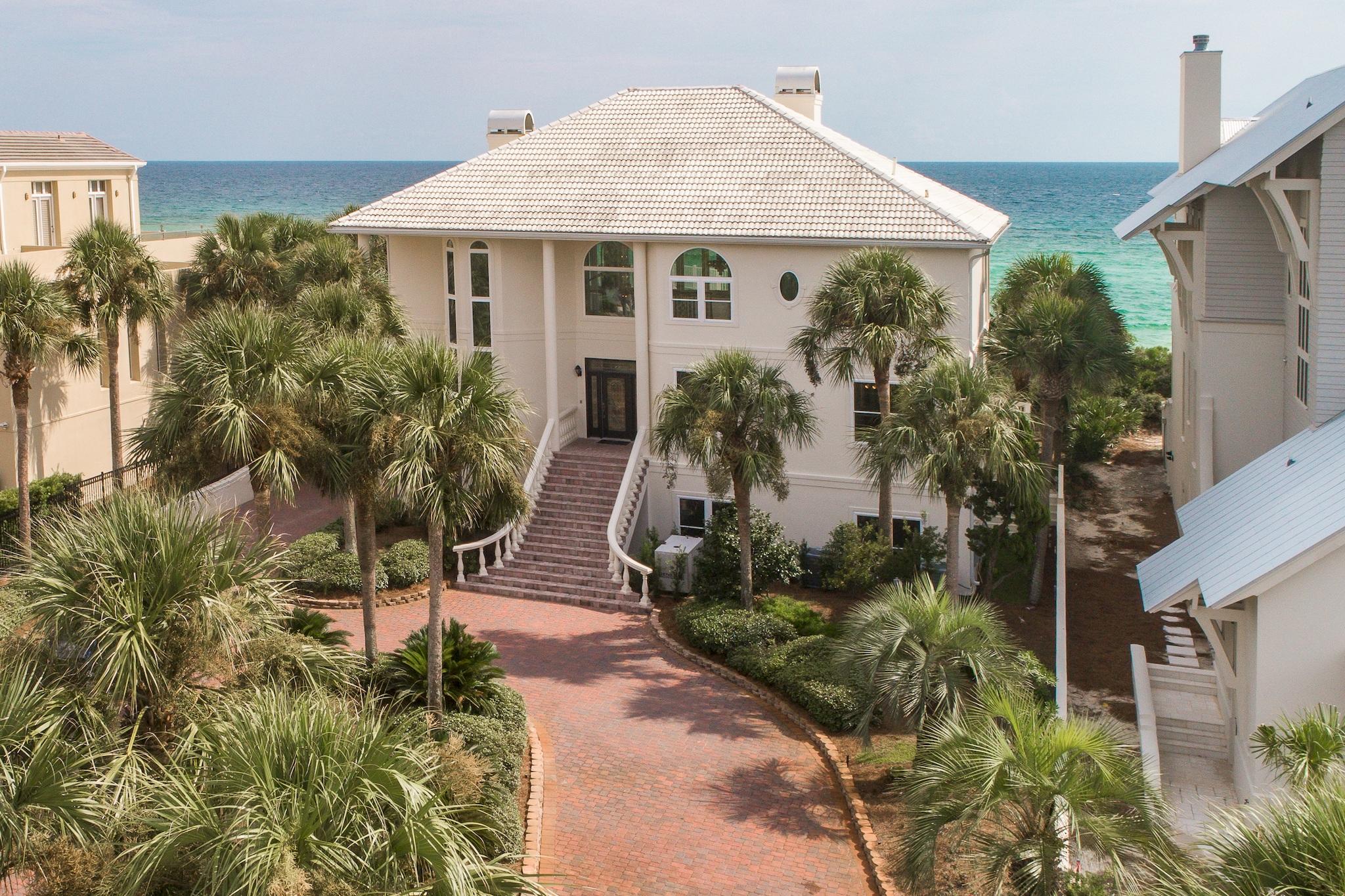 This magnificent Gulf front home in the exclusive gated Gulf Dunes subdivision of Scenic 30A is sure to impress. Enjoy plenty of open space as this estate property is 5,729 sq ft and situated on a huge lot with ~85 ft of gulf frontage and 370 ft of depth. The home features 4 bedrooms offering two Gulf front bedrooms on the first floor, a large Gulf front Master bedroom on the second floor, and a bedroom on the ground floor, 4 baths, and a spacious office that could be converted into a 5th bedroom. In addition there are very large Gulf front balconies maximizing the views, private boardwalk, gulf front pool and hot tub, fireplaces, custom kitchen, a generator that serves the entire home, enormous 4 car garage and new elevator that services all three floors. Home appraised for $4,955,000. The moment you enter you will be inspired by the elegance of the grand staircase, rich natural light, and luxury amenities. A beautiful great room is the central hub of the home, a wraparound balcony deck and large windows offer amazing Gulf views from nearly every room in the home. A fantastic poolside wet bar and media room creates the perfect space for entertaining guests and family. Truly an ideal beach estate with recent exterior upgrades throughout including new windows, stucco, and paint. 

The 30-A beach lifestyle is waiting for you. Enjoy the great outdoors with the surrounding state parks, nature trials and the 22-mile bike & jogging path. Kayak or paddle board on one of the rare coastal dune lakes and experience all the hidden natural wonders of the area. There are many options nearby for dining and entertainment and you are close to the picturesque towns of Seaside, WaterColor and Rosemary Beach.

Fine dining, upscale shopping and local arts and music are abundant along the beautiful Emerald Coast of Florida. This home is located just minutes from Gulf Place, renowned for excellent dining, shopping and nightlife. And it is home to the world famous 30-A Songwriters Festival. If you can tear yourself away from the beautiful beach, there will be no shortage of opportunities to enjoy all that this wonderful area has to offer.