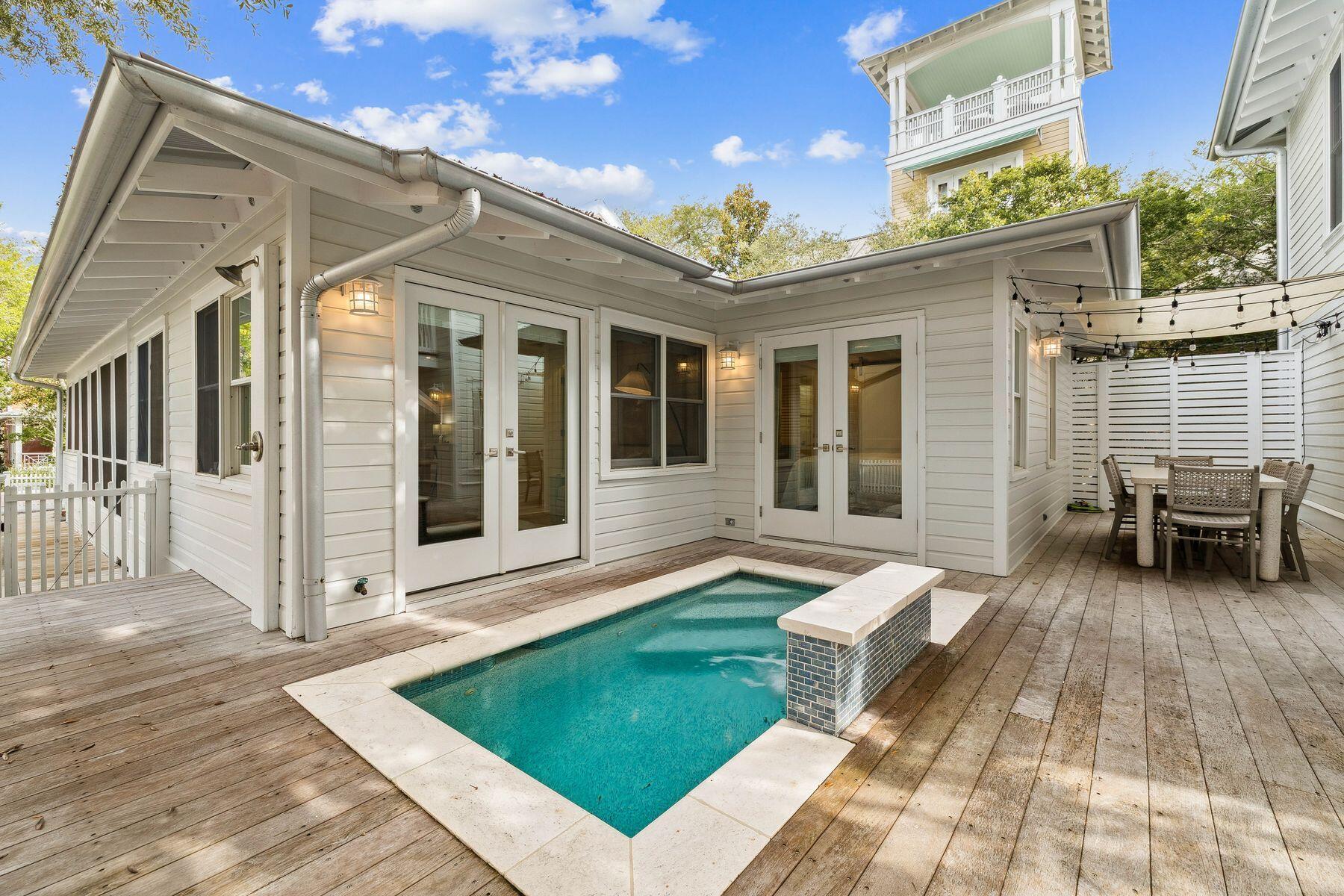 Seaside, now in a clear state of renewal offers 60 Savannah Street for your consideration. Masterfully recrafted in 2020, this home, one of only a few with a pool, gains substantial rental while it offers a completely modern living space. The main home is 3 bedrooms and 2 baths along with a well crafted kitchen sporting Wolf and Subzero appliances. The carriage house is a 1 bedroom and 1 and 1/2 bath completed recreated space. A separate rental or a special place for the older kids, walking to the beach is just a short stroll. Town center is at your fingertips. There has never been anything like Seaside and there will never be anything like Seaside as it continues to prove its significance even as it is renewing for the next generation.