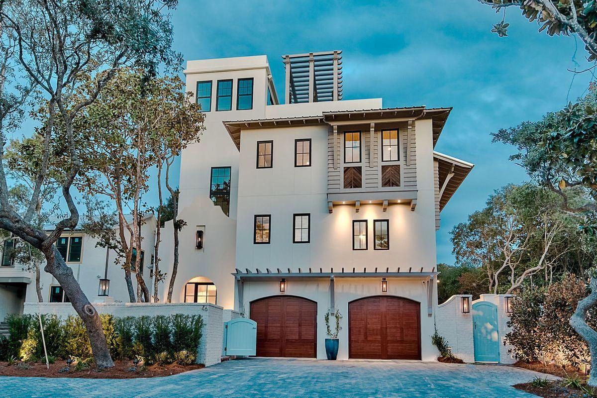 Stylish coastal contemporary design juxtaposed artful sophisticated decor define this highly curated family retreat primely located on Azalea Street; only one block from the beach; in Old Seagrove Beach, along 30A. Designed for legacy living, this seven bedroom home is heavily amenitized and well appointed offering an open floor plan design with multiple living spaces on each level and optimal accessibility from the hydraulic elevator allowing easy access to all four levels. The formal entryway is a beautiful walled courtyard complete with sprawling native vegetation and ambient gas lanterns flanking a steel front door which flows seamlessly into a spacious vestibule highlighted by reclaimed wood ceilings and painted brick accents. The first level is occupied by dual living spaces offering exceptional design elements including venetian plaster walls & peacock paver flooring and is anchored by a highly curated kitchen designed to be the heart of the home outfitted with Subzero and Wolf appliances with reclaimed pecky cypress beamed ceilings as well as custom cypress cabinetry that was hand built onsite to accentuate the unparalleled aesthetics that make this designer home so special. 

The living room and subsequent kitchen & dining area offer an open living layout that evokes both character with it's rustic design as well as optimal entertaining space with access to the spacious pool though a floor to ceiling glass eurowall that allows indoor and outdoor living to be seamless. A laser projector provides entertainment and a theatre style viewing area in the spacious rear courtyard that can be enjoyed from both the pool, kitchen/living room and surrounding pool deck which offers mature lush landscaping including 30' tall magnolia trees as well as an outdoor grilling area, ambient fire pit and outdoor shower; all of which is privately enclosed by 10' brick clad courtyard walls. The first level also offers a spacious pantry and custom-built wet bar with sleek lighting and easy access to a full pool bath and bunk room located just off the oversized two car garage. 

The second level is compartmentalized to allow multiple guest suites. Upon ascending the stairwell, immense attention to detail is realized; every wall, floor to ceiling has been highly curated with coastal design from the construction & design team at Old Seagrove Homes. No expense was spared when designing and rendering this home. The stairwell is draped in reclaimed wood accents including white washed pecky cypress and a chevron stairwell using submerged river cypress spanning an impressive double height ceiling. There are three additional guest suites on the second floor that offer ensuite bathrooms including one large bunk room complete with a reading nook and walk-in closet. The third level is the master level offering a spacious master bedroom suite complete with an entry vestibule accented by a private library and storage area as well as beamed ceilings and ship-lap walls as well as a spa-like master bathroom covered in beautiful statuary honed marble including a massive soaking tub, dual vanities and sizable walk-in shower. The master level features another large bedroom suite and ensuite bathroom as well as a third living room complete with a well equipped wet bar with close proximity to the top floor open deck. 

The fourth level is the pinnacle of beachside living offering a sun deck with enviable south facing views. The top floor deck is accessible by elevator or stairwell and offers teak lounge chairs, a floor to ceiling glass slider, paneled glass railing to enjoy uninterrupted views as well as charming potted jasmine that yields vertical greenery on the contemporary trellis which perfectly frames pristine sunset vistas. This unprecedented home was designed for multi generational living and outfitted as a transitional home with attractive short term rental opportunity ($330,000+ projected annual gross rental income) as well as other notable features which include a water softener system, hurricane rated impact doors and windows, ample parking with belgian cobblestone pavers and a professional furniture package which will be fully installed by December 1st, 2019. 

Azalea Street is perfectly located in the heart of Seagrove Beach central to all of the new urbanism communities on 30A while being a bike ride away from Seaside, Watercolor and all of the subsequent world class shopping, dining and entertainment that these family friendly communities are known for.