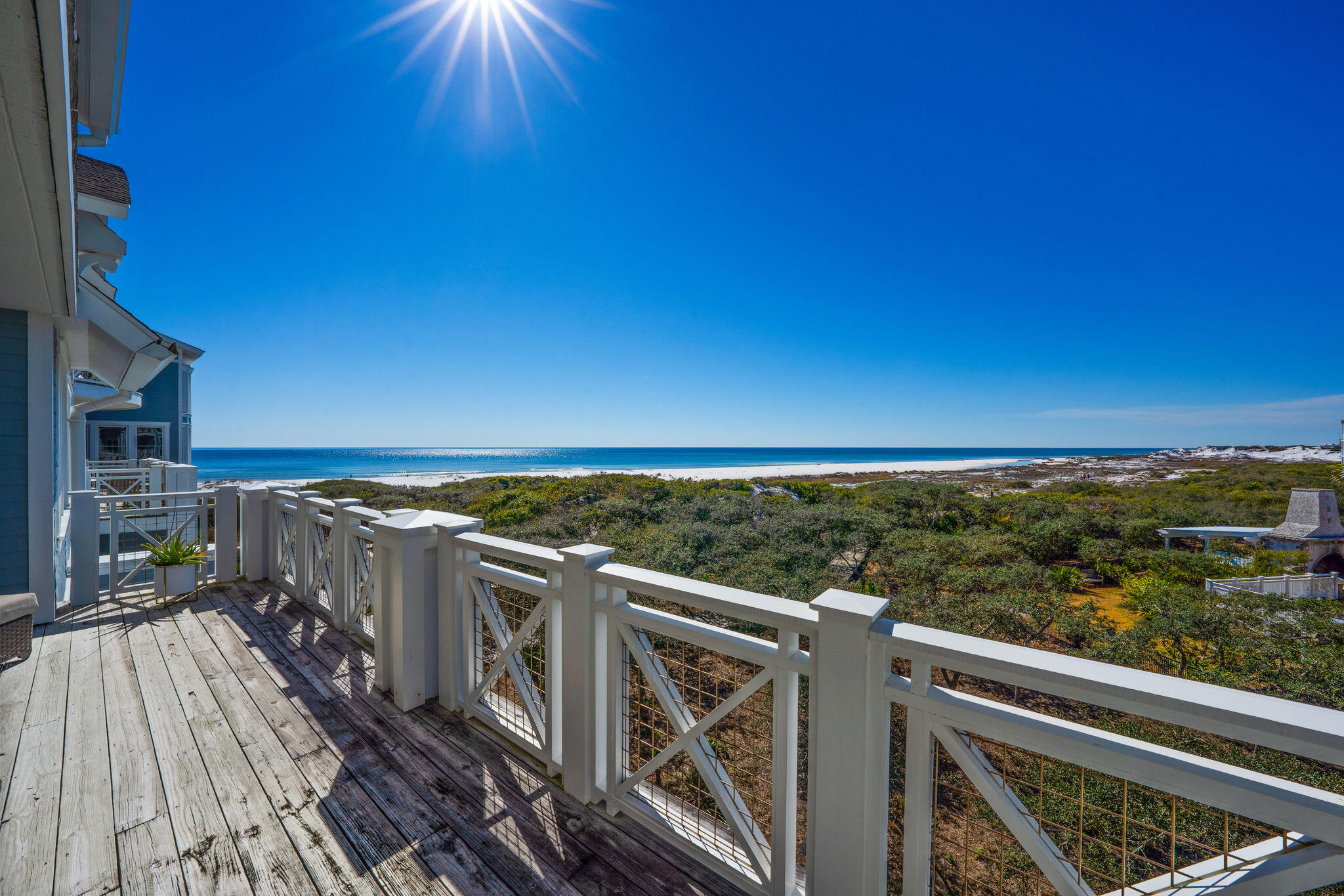 Located within the gated community of Watersound Beach, experience premium gulf-front living with this third floor single story Watersound Crossings unit. Enjoy low density living paired with spectacular views of undisturbed coastal dunes and endless sparkling gulf waters. The open living, dining and kitchen areas highlight an abundance of natural light and present the perfect layout for entertaining guests. Located off of the living area, the expansive porch offers a great space to enjoy the spectacular Gulf of Mexico seascape. The master suite features a sitting area, ensuite with double vanity, walk-in shower and jetted tub, and large walk -in closets. Ensuring guests privacy, there are two additional guest suites located on the other side of the living room. A powder bath, click more.. large laundry area, and owners closet complete the unit. Other notable features include hardwood flooring, stainless steel appliances, custom cabinetry, expansive windows, tile, and deeded single car garage. Recent updates include washer and dryer, dishwasher, HVAC, dehumidifier, mirror and lights in master bath, and hot water heater. 
Inspired by the architectural style of coastal New England, Watersound Beach is a gated community situated on over 1400 acres, with 90 acres of coastal dunes and over a mile of private coastline. Amenities include: community pools, fitness center, puttering park, community green spaces, various parks, trails, and miles of pedestrian paths and boardwalks leading to the beach.