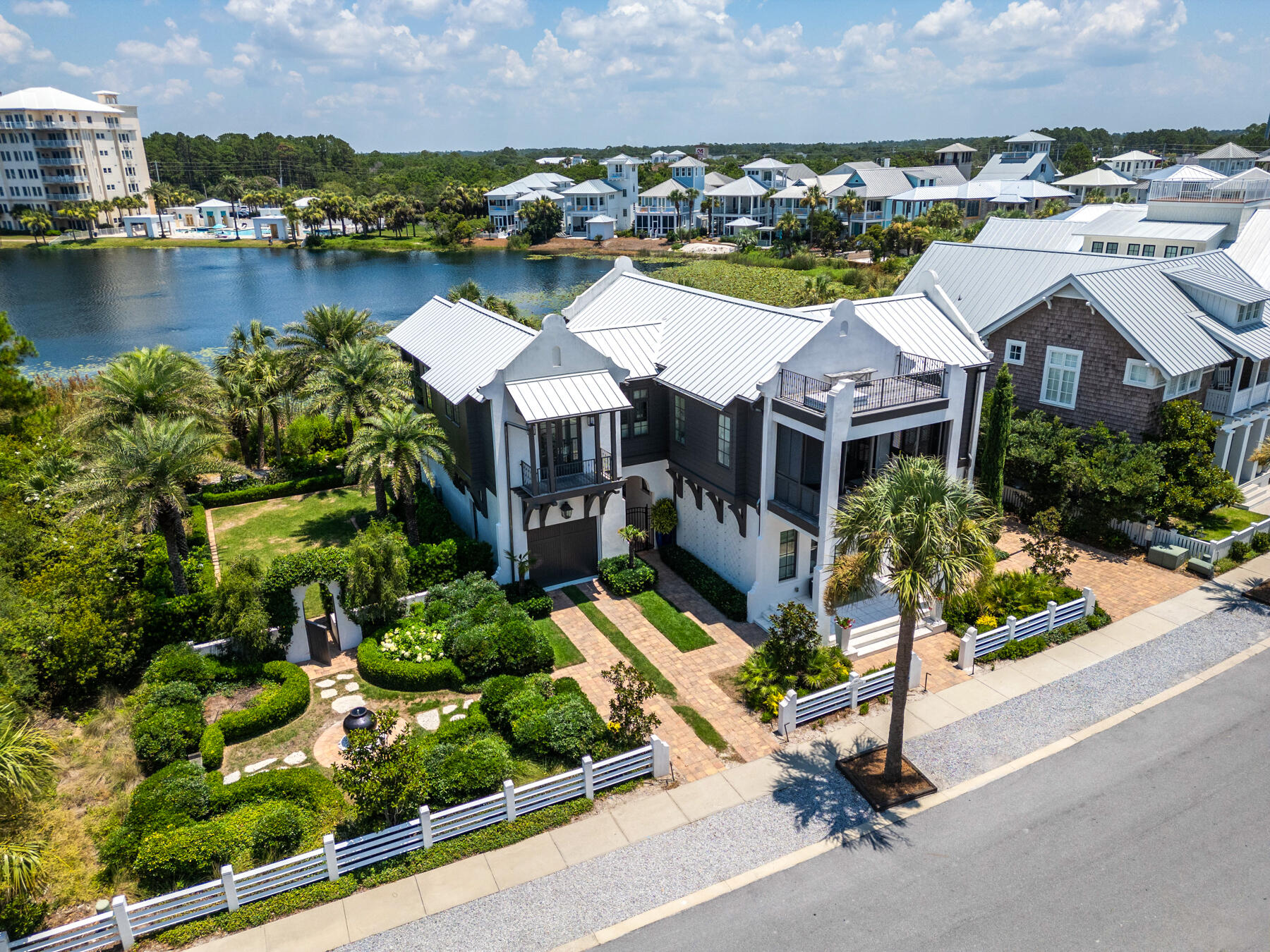 30-A's quadrant is showcasing coastal luxury living at its finest with a breathtaking gulf view home on Lake Carillon and over 3000sq ft of meticulously designed space with high end finishes throughout.Sun drenched interiors showcase the soaring ceilings, with distressed beams and expansive windows that frame the spectacular views. The heart of the home is the gourmet kitchen, a chef's dream come true with top of the line appliances, custom cabinetry, and granite countertops. Retreat to your lavish primary suite, with stunning lake views and the most inviting screened porch! Step outside to your private oasis where your sparkling oasis awaits you in the lush tropical setting. Plenty of parking and space for your vehicles and toys.
With direct beach access in a gated community! Divine!
