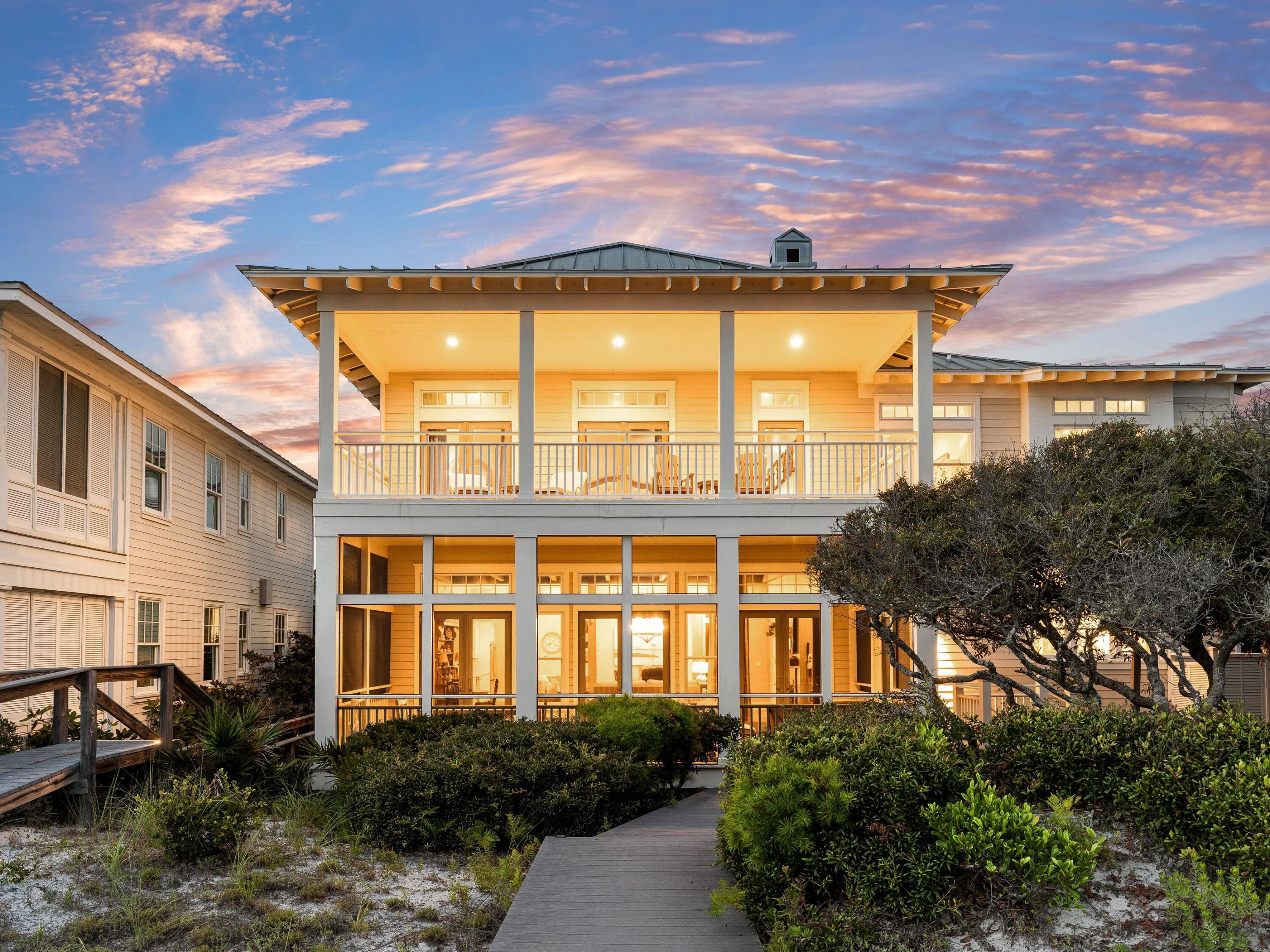 Located in the private, gated community of Old Florida Beach, this gulf-front home offers direct access to the beach with its own Trex-plank walkover. The home features 11-foot ceilings with wood beams, a chef's kitchen with granite countertops, stainless appliances, and a large island with cooktop. The great room opens to a spacious screened porch with sweeping views of Draper Lake and the Gulf of Mexico. Upstairs, an oversized balcony provides more space for entertaining and enjoying sunsets. Four of the six bedrooms also share stunning gulf views.
Old Florida Beach offers a private beach, heated community pool, Draper Lake dock, and three beach access points. This established neighborhood is ideal for full-time living or as a vacation rental.