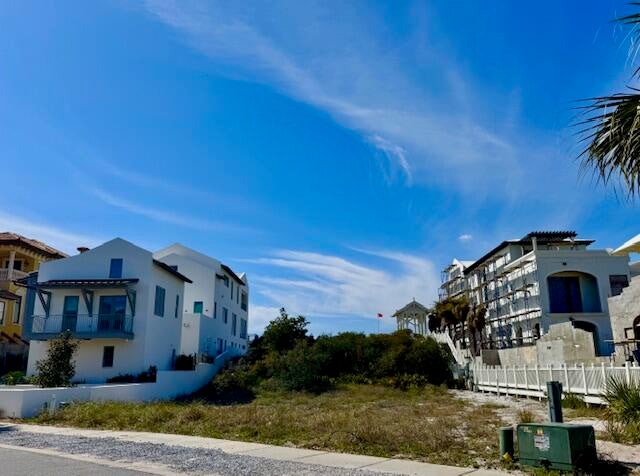 Last spectacular 60' gulf front lot with its own private beach walkover and across the street from Lake Carillon.  The exceptional depth of this lot allows for a large house, a pool, and an oversized guest house.  Previously approved plans for a magnificent house and guest house are available.  Do not miss out on the last 60' gulf front lot available in Carillon Beach.