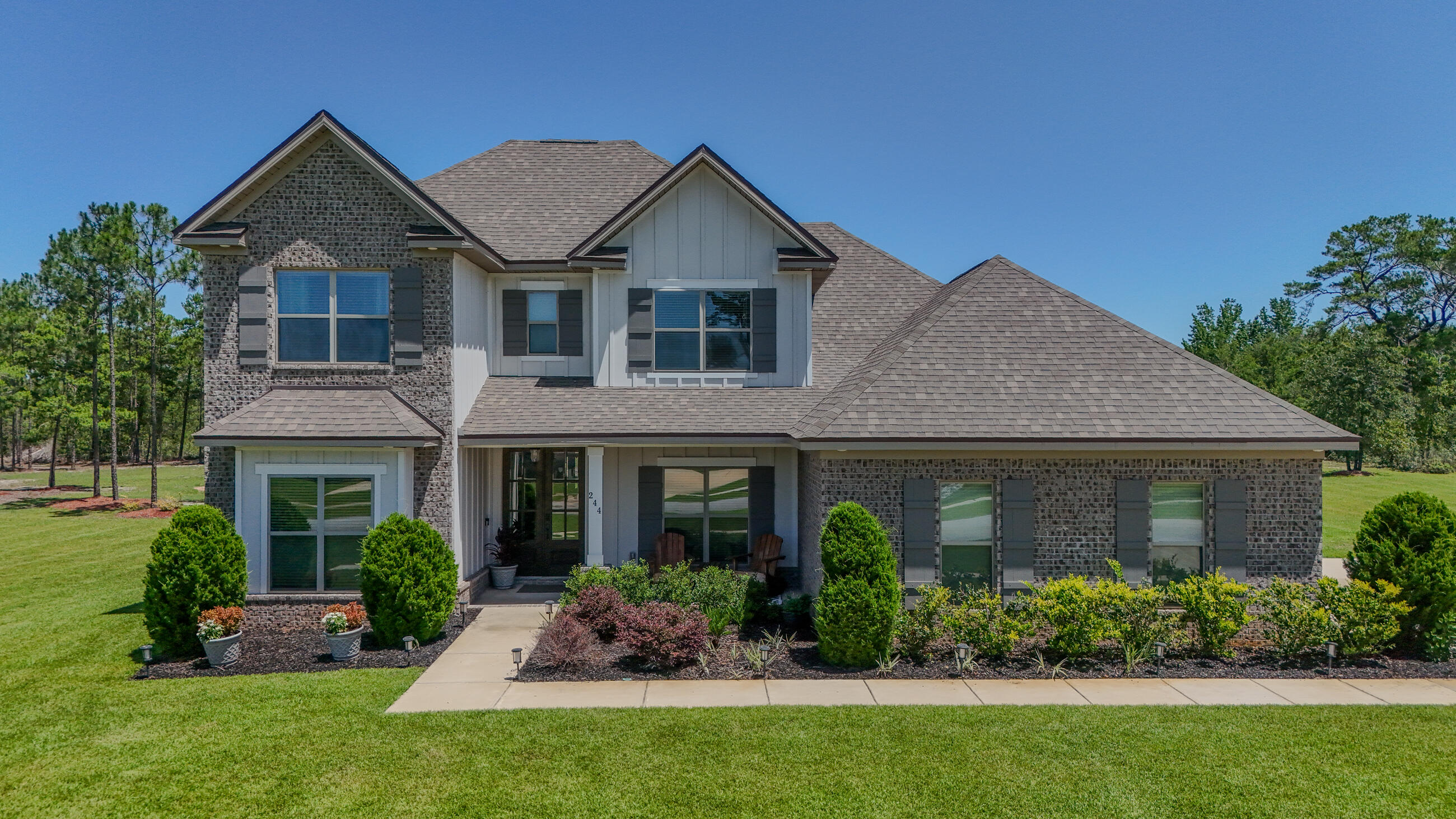 Welcome to 244 Coastal Breeze Drive—a beautifully crafted 5-bedroom, 3-bathroom home built by Truland Homes, situated on an expansive 1.51-acre lot in the sought-after Windswept Estates golf community. Designed with comfort, elegance, and functionality in mind, this home offers an exceptional floor plan ideal for families of all sizes.

As you enter, you're greeted by a large open foyer with soaring ceilings that create an airy, welcoming ambiance. The main level features a spacious primary suite with an upgraded ensuite bath and walk-in closet, along with a second large bedroom and full bath—perfect for guests or multigenerational living. A formal dining room adds a touch of sophistication, while the oversized family room with a cozy wood-burning fireplace invites relaxation. The chef's kitchen is a standout, showcasing quartz countertops, abundant cabinetry, and a layout that seamlessly connects to the main living areas-ideal for entertaining. All bathrooms and the kitchen are finished with sleek quartz surfaces, and the home features upgraded flooring in the living areas and primary bedroom.

Upstairs, you'll find three generously sized bedrooms, each with large walk-in closets. Smart design details include a laundry room on the main floor, under-stairs storage, and thoughtful flow throughout.

Property Highlights:

Built by respected builder Truland Homes

5 bedrooms, 3 full bathrooms

Primary suite and guest bedroom on main level

Quartz countertops throughout kitchen and bathrooms

Upgraded flooring in main living areas and primary bedroom

Wood-burning fireplace

Walk-in closets in all bedrooms

1.51-acre lot with room for pool or outdoor expansion

Located in gated Windswept Estates with golf course, pool, playground & more

This home checks every box-comfort, space, craftsmanship, and a location in one of Freeport's premier neighborhoods.