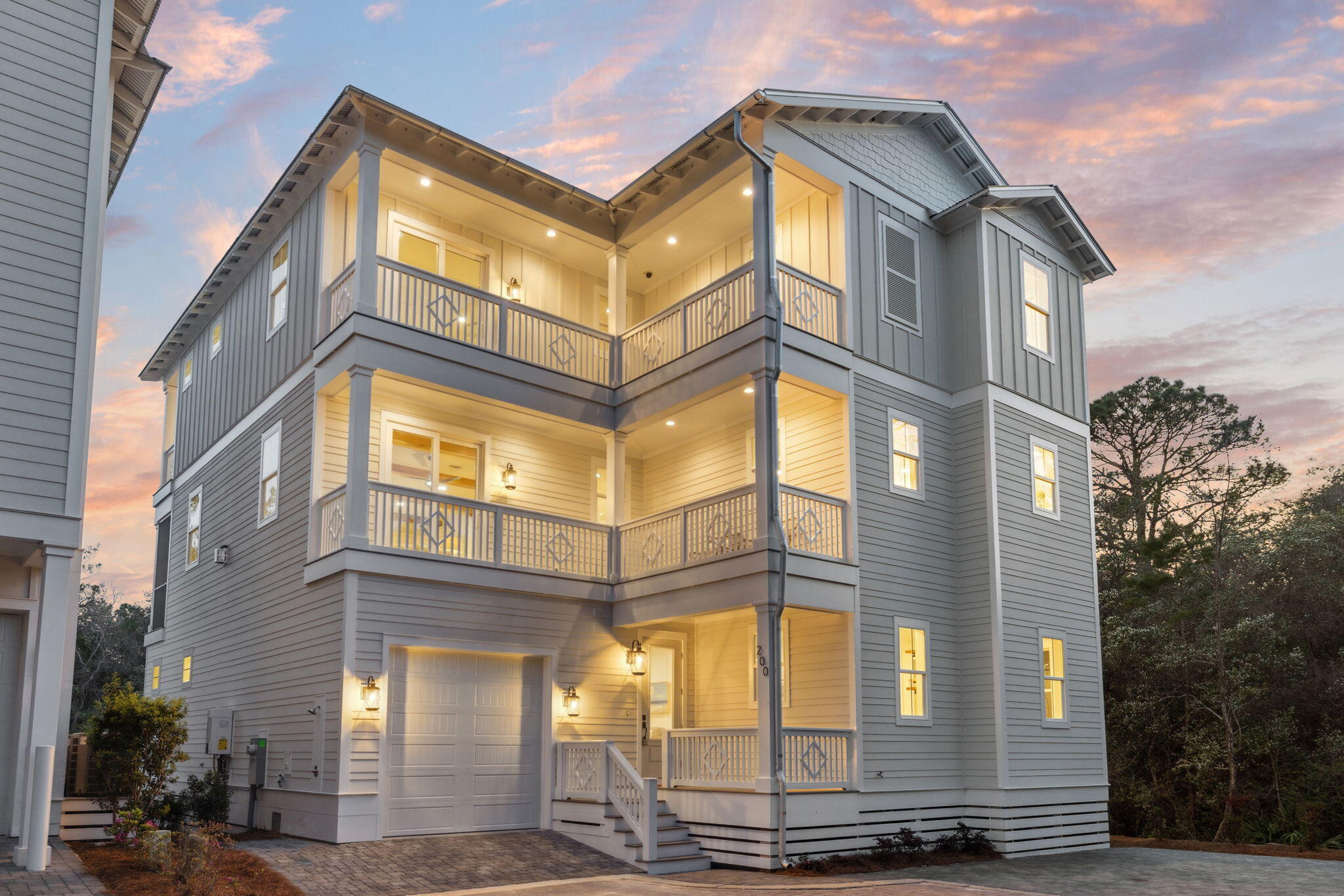 200 Grayton Blvd offers the perfect combination of coastal charm, thoughtful design, and incredible outdoor living space. Spanning three levels, this well-appointed home provides ample room for relaxation and entertaining, with multiple balconies that invite you to soak in the fresh sea air. Just moments from Grayton Beach's beloved shopping, dining, and large public beach access, this property offers an ideal setting for those looking to embrace the laid-back 30A lifestyle.

On the first floor, a primary bedroom & upscale bathroom showcasing high-end finishes and a solid surface soaking tub  offers a quiet retreat, perfect for visitors or potential rental opportunities. The second floor features an open-concept great room, chef's kitchen, and dining area, designed for effortless entertaining. Large windows bathe the space in natural light, while high-end finishes and coastal-inspired details enhance the home's inviting atmosphere. Step outside onto the spacious balcony, perfect for enjoying morning coffee, evening cocktails, or simply unwinding after a day at the beach.

The third floor is dedicated to the home's private quarters, including the comfortable and serene primary bedroom, complete with an ensuite bathroom and a private balcony that provides a peaceful escape. Two additional guest bedrooms also feature balcony access, allowing everyone in the home to enjoy the beauty of outdoor living.

One of the standout features of this home is its abundance of balcony space. With multiple outdoor living areas on both the second and third floors, this home seamlessly blends indoor and outdoor living, making it easy to relax, entertain, and fully embrace the coastal lifestyle.

Beyond the home's beautifully designed interiors, its location is unbeatable. Just a short walk to Grayton Beach's lively town center, residents can enjoy iconic local favorites like The Red Bar, Chiringo, and an array of boutique shops and art galleries. With a large public beach access nearby, the sugar-white sands and emerald Gulf waters are always within easy reach, making every beach day effortless.

Whether you're looking for a primary residence, a second home, or a high-performing investment property, 200 Grayton Blvd offers the ideal blend of luxury, location, and laid-back coastal living. Enjoy the best of Grayton Beach with the comfort of expansive balconies, thoughtful design, and unbeatable proximity to everything 30A has to offer.

Please reach out for cost-to-own figures & rental projections.
