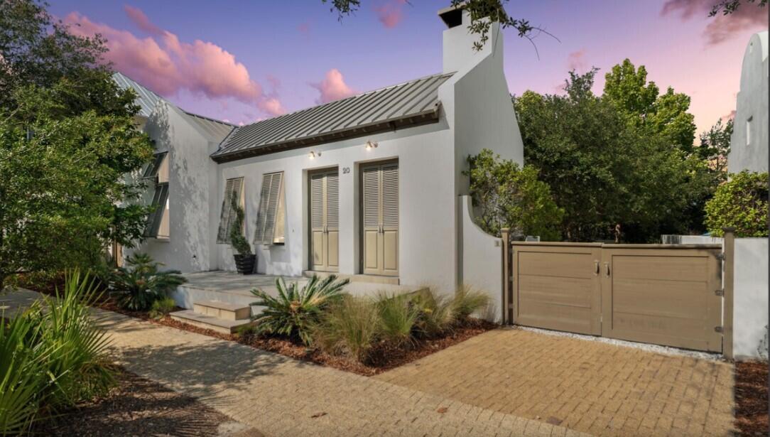When someone says a ''house is a unicorn,'' it means they are describing a home that is considered nearly impossible to find, with perfect features, qualities, and development  possibilities that it's essentially mythical like a unicorn. 

 You will love the open floor plan!  Stained concrete floors, vaulted ceilings, quartz counter tops.  A full chef's kitchen with stainless and solid surfaces .  Just down the hallway is the Primary Suite with a King bed which includes a totally renovated Primary bathroom.(new pictures coming soon) There is a large walk-in closet. The other two spacious guest bedrooms have Queen beds.   Wake up in any of these bedrooms to the warming sunlight draping in from your adjoining doors that leads you out to the beautiful courtyard.  Another full bathroom sits between the two bedrooms and the adorable twin bunk-bed located in the main hallway. Outside the cottage is 821 sf of relaxing outdoor living area and covered porch and loggia. The home is directly across from the Owner's Pavilion.  
Based upon the information reviewed by Town Architect it appears that there is 811 SF remaining that could be constructed as impervious and result in in the allowed 50% impervious coverage.  Add a carriage house and/or pool.  On expanding the house footprint, the Urban regulations limits the width of the house wings to 25'.  Enlarging the footprint would need to comply with the Urban and Architectural Regulations adding a second story to the house.  Any house on the Type IX House/Lot type is allowed to be two stories.