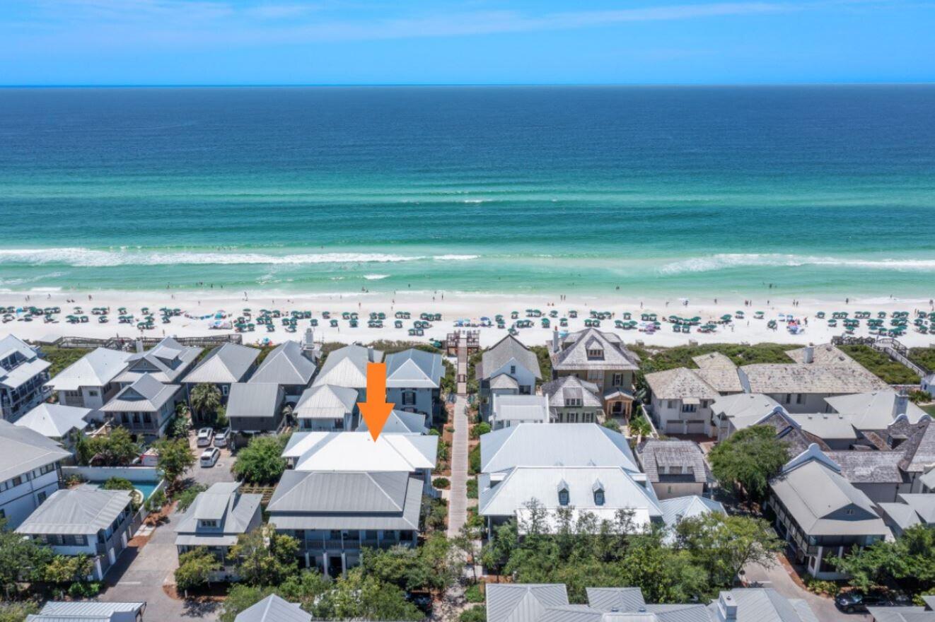 Gulfside in Rosemary Beach, this charming, well-designed designed coastal home is just steps from the beach walkover with the front porch facing the boardwalk.  Recently renovated by architect, Darrell Russell of A BOHEME Design and builder, Chris Ritchie.  Poised just a few tiers back from the Gulf and features an incredible and spacious outdoor oasis, providing a great place for friends to gather and a place to entertain. The first floor hosts the main living areas with tall ceilings and, hardwood floors and crown molding throughout the home.  The spacious living room allows for ample seating and comfortable living.  The kitchen is a perfect gourmet space to prepare everything from light appetizers to full meal entrees and features the GE Cafe series appliances, designer lighting and backsplash, farmhouse sink, new cabinetry, and a custom done kitchen island with Vetrazzo recycled glass countertop and built in shelving.  The dining room is just off the kitchen and the living creating a natural flow throughout.  Take the stairs to the 2nd floor which hosts the 3 bedrooms.  The bunk room contains 4 build in beds and french doors that lead out to the front facing balcony.  The adjacent guest room features a private en-suite and also has french doors that lead out to the front facing balcony so guest can enjoy with Gulf View and cool breezes.  Down the hall is a cozy reading nook, proving the perfect place for some time to yourself.  Next to the reading nook is the master suite.  The master suite features Gulf views,  a walk-in closet, private en-suite and office space, offering a great place to start and end your everyday at the beach.  

An ideal location, south of 30A, on Rosemary's east side, lends a quieter, tucked away spot, just steps to the beach walkover and an easy stroll to the bustling activities of Town Center. Rosemary Beach embraces the principles of traditional town planning with a pedestrian friendly design. With its brick-lined streets, charming town center, unique shops and locally-owned cafes, locals and guests alike delight in this picturesque 30A community. Discover life at the beach at 14 Atwoods Lane and enjoy the pedestrian-friendly coastal lifestyle of the iconic new urban community of Rosemary Beach. Buyer to verify all dimensions.