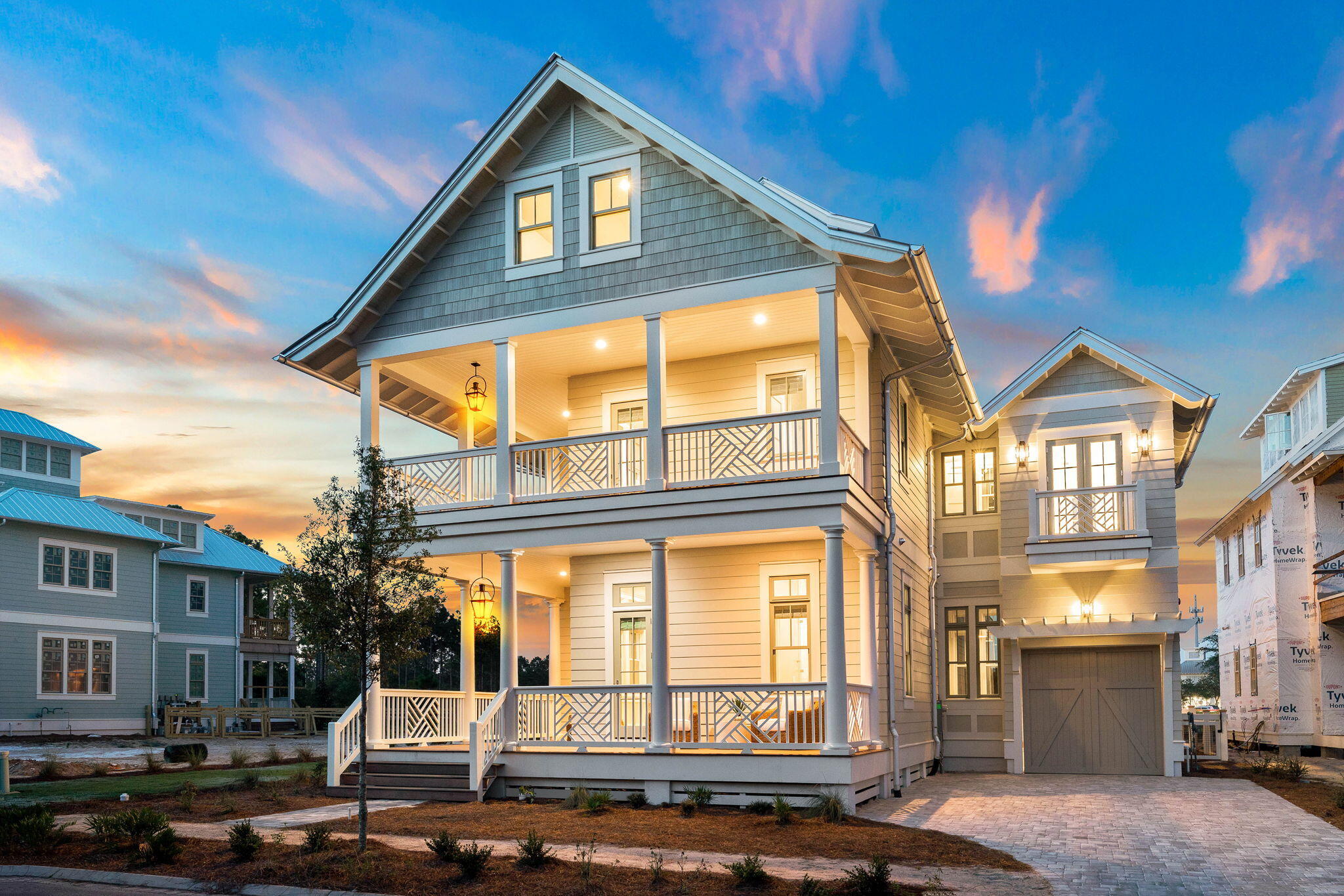 Nestled in the final phase of WaterColor within the sought after Park District, this newly constructed edifice offers the epitome of luxury coastal living. The expertly planned design spanning four distinct levels and over 4,700 square feet was drafted by Archiscapes and executed by the renowned team at Minchew Construction. Bordered by preserve area to the North and pond frontage in the rear the outdoor porch space, totaling over 1,400 square feet, takes full advantage of the prime homesite location. 

Upon initial approach, the welcoming foyer leads the way to the expansive kitchen and living area adorned with pecky cypress beams and stunning hardwood floors. The gourmet kitchen features custom cabinetry with modern slab fronts, an island with integrated seating, Thermador refrigeration, and AGA range.

Blurring the line between indoors and out, the bi-fold nano doors create an opening that spans the entire living room wall fully leveraging the refreshing summer breeze and views of the pond frontage while also providing direct access to the backyard oasis which encompasses an outdoor kitchen, living area, and private heated pool. A bedroom suite, laundry area, half bathroom, and drive-through garage complete the first level.

The stately staircase and vestibule styled elevator provide access to the upper levels while doubling as a work of art. The main suite boasts a walk-in wardrobe with dedicated dressing area and sumptuous ensuite with a custom tiled shower, dual vanity, separate water closet, and soaking tub. A secondary living area, two bedroom suites, half bathroom complete with a laundry center, home office, and home gym area are also found on the second floor.

Situated on the third floor, the home theatre was designed with entertaining and family gatherings in mind. The third floor is also home to an additional bedroom suite that could be utilized as a secondary home office if desired. Perched atop the roofline, the window-lined cupola is the perfect place to admire the palette of vibrant colors and majestic glow exuded from the famed Emerald Coast sunsets each and every night.

The short term rental restrictions within the Park District uphold the privacy and exclusivity of the community while creating a compelling opportunity for full time and second home residents alike. WaterColor amenities include a beach club, fitness center, town center, tennis courts, ample walking trails, and close proximity to all of the world-class dining and entertainment venues 30A has to offer.

Inquire today to schedule a private viewing and start envisioning the coastal lifestyle you deserve.
