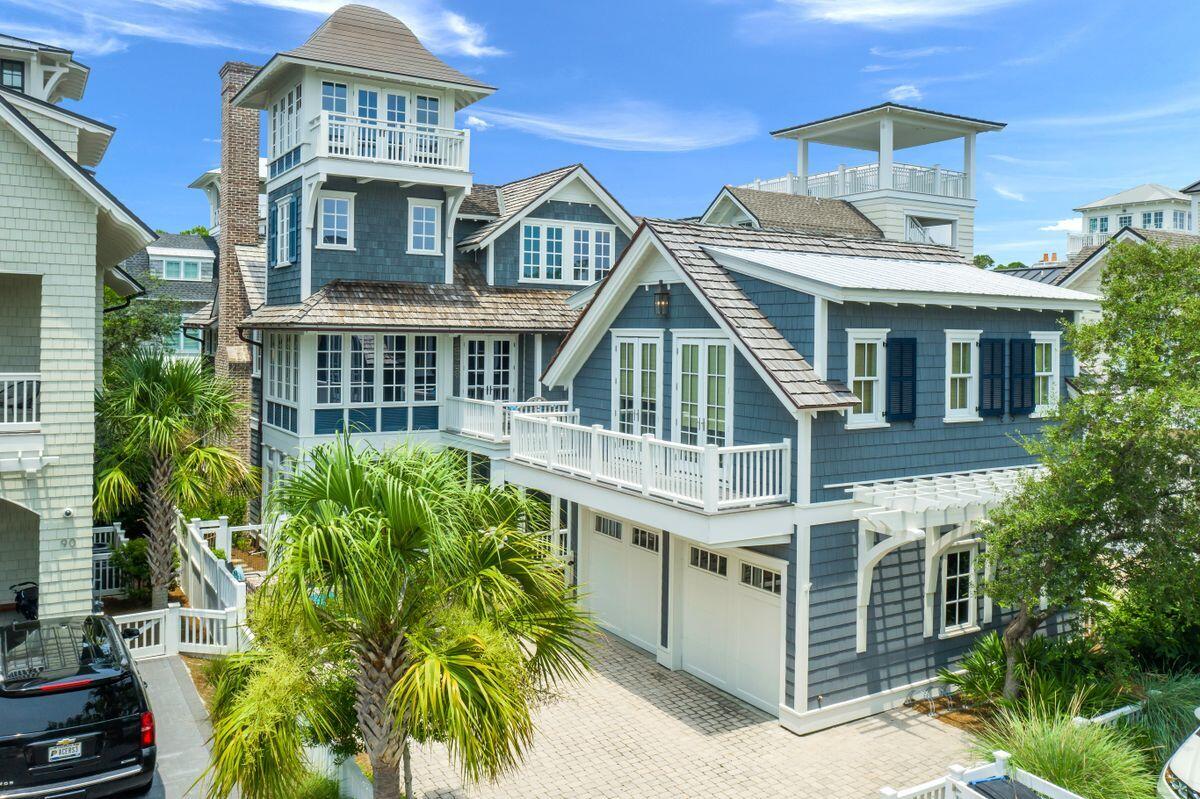 For comp purposes only. The kitchen boasts a large center island, walk-in pantry, mahogany-topped wet bar, wine cooler and Thermador gas range. The second floor includes a second owners' suite with adjoining screened porch with bed swing. On the third floor, enjoy ample sleeping quarters with a large bunk room as well as a nursery, reading nook and full bath. Peek out the third-floor watch tower to catch glimpses of the WaterSound Beach community and Gulf of Mexico beyond. This jewel in WaterSound Beach sparkles with endless gulf views, is situated just steps to the beach and puts you in the heart of all that 30A has to offer.