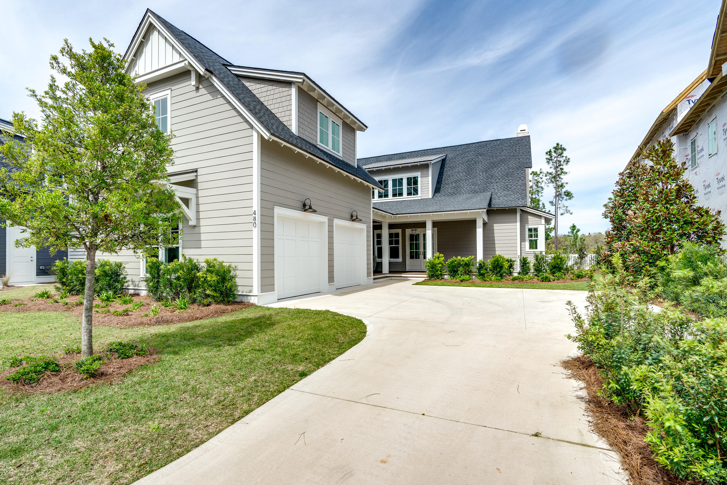 This custom Weatherly plan built by Romair Homes is situated on a premium home site overlooking the Origins Golf Course with a spectacular outdoor living space. This home design offers 5 bedrooms including a first floor primary suite and Carriage House, 5.5 bathrooms, 2-car garage, private pool + spa with Baja deck, 2 fireplaces, an outdoor summer kitchen and loads of upgrades! Luxury interior features include Jeld-Wen slider doors leading to a 12' wide porch overlooking the golf course, large carriage house (600 SF) with kitchenette and storage closets, custom cabinetry, Wolf & Sub-Zero appliances with 36' Wolf range and Scottsman Ice Machine, wet bar, steam shower in primary bath, marble and porcelain tile baths, engineered hardwood floors throughout, and  more! The expansive outdoor living area is the perfect place to relax and entertain with enhanced landscaping, heated/saltwater pool with peacock paver deck and raised Spa, Cabana with Isokern Fireplace, complete with Cumaru hardwood decking, a convenient outdoor powder room and a storage closet for pool and beach accessories!
The Watersound Origins community is one of South Walton's most coveted neighborhoods for its exceptional amenities, beautiful new homes, and prime location. Amenities include the Village Commons pool & fitness center, sports courts, miles of nature trails, dock access to Lake Powell, unlimited golf, and lots of green space for outdoor play. The all new Watersound Town Center brings a new level of excitement and convenience to the community with a Publix Super Market, Delicious restaurants, healthcare facilities, a weekly Farmers Market, and more right at the entrance to the neighborhood!