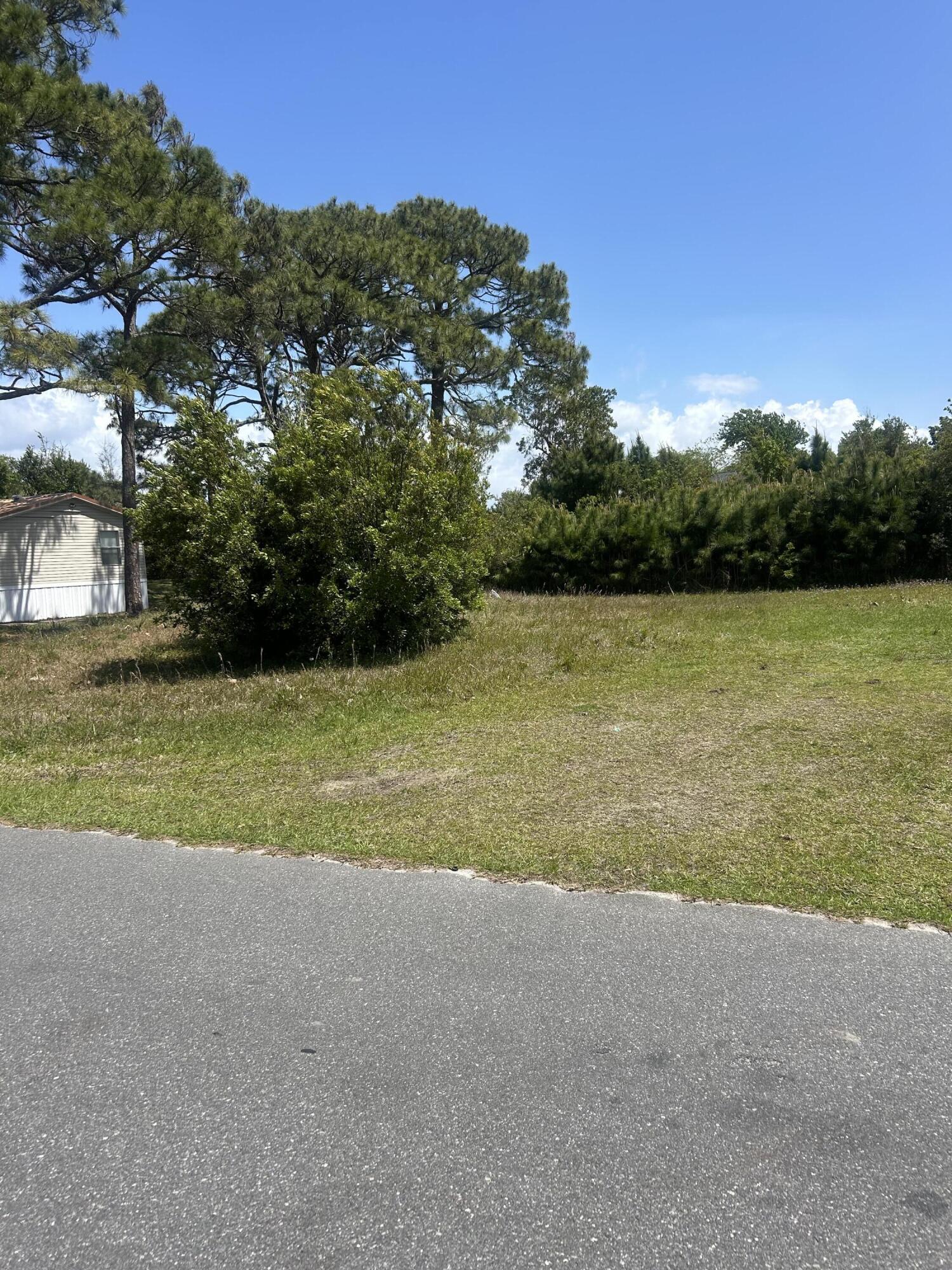 Prime vacant lot located in the desirable North Lagoon Oaks subdivision, less than a mile from the beach. This versatile property is zoned for single-family or duplex, making it perfect for building your dream home, a vacation getaway, or an income-producing rental.
Existing survey.