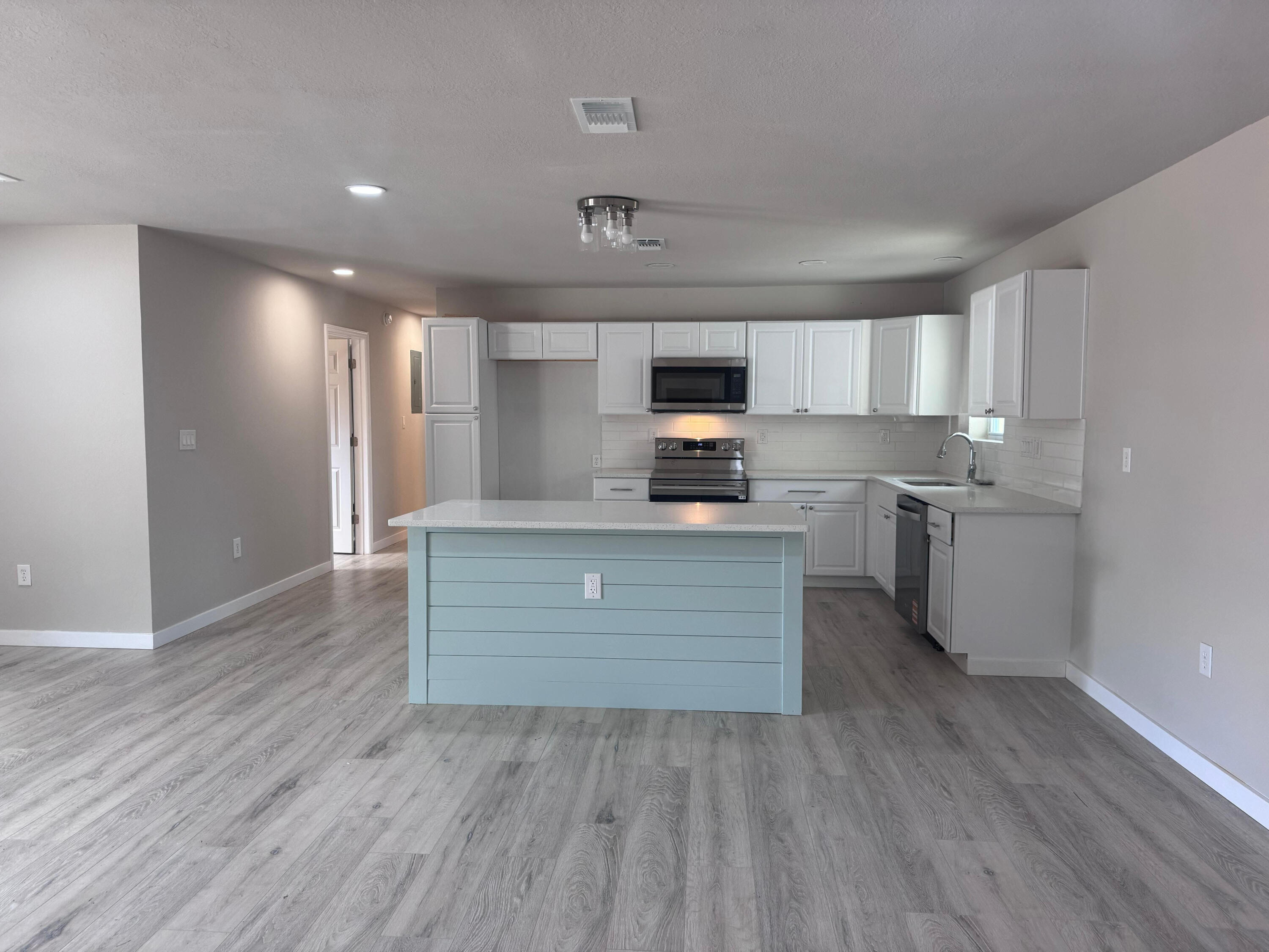 Completely renovated all-brick home in the heart of Fort Walton Beach! Just two blocks from Elliott Point Elementary and Docie Bass Park (tennis courts, ball fields, rec center, walking paths). 
Nearly 2,800 sq ft heated and cooled with permitted additions and a Florida room; Property Appraiser shows approx. 2,600 sq ft under roof. 
This home offers 3 private master suites, each with a full bath, plus a 4th full hallway bathroom. Major updates include brand new wiring, roof, HVAC, water heater, flooring, paint, and a fully redesigned kitchen with new cabinetry and countertops. Enjoy fantastic, plush landscaping, and sunroom. Golf cart-friendly neighborhood, walking distance to FWB Yacht Club, close to Ferry Park courts and just minutes to the beach.