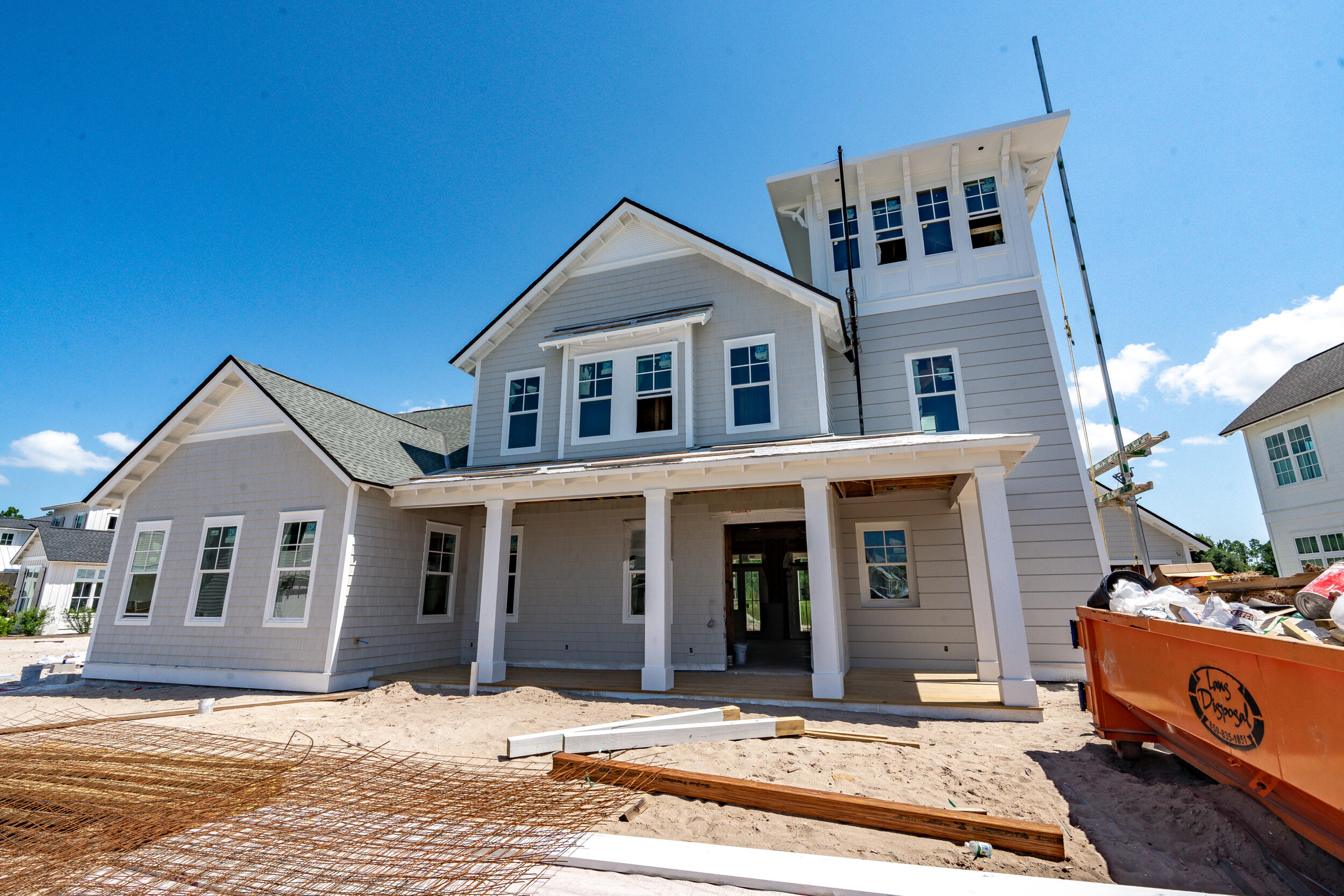 This stunning new home built by Dune Construction features the Watchtower floor plan, a stately residence with coastal-style architecture and premium finishes culminating in a third floor viewing tower that overlooks the Greenway neighborhood and Origins Golf Course. A spacious 3-story, 4 bedroom, 4.5 bathroom layout, this home hosts a fabulous, open-concept great room, kitchen, and dining room, plus a third floor den! Interior features include wire-brushed hardwood floors, wood ceiling beams in the great room and primary bedroom, 11' ceilings on the first floor, 10' ceilings on the second floor and 11' ceilings in the tower, solid core interior doors throughout, Venetian plaster gas fireplace in the great room, a large, fully-equipped kitchen with Thermador appliances and quartz countertops, marble bathroom and laundry countertops, and more. From the front entry, a dedicated foyer leads to the wide open great room and luxurious kitchen, with an adjacent dining room surrounded by natural light. Around the corner from the kitchen is a large scullery with additional sink, microwave, and plenty of cabinetry. The first floor primary suite is a serene retreat complete with two closets, dual vanities, and a tiled walk-in shower centered with a freestanding soaker tub. An expansive outdoor living space includes nearly 1,000 square feet of covered porches plus a private pool and cabana package with fireplace. 

The second floor holds 3 additional bedrooms, each with their own bathrooms. Finally, at the top of the stairs, in the home's namesake tower is a cozy den surrounded by windows with breathtaking, panoramic views across the community and golf course.

The Watersound Origins community is a highly sought after neighborhood full of amenities including the Village Commons pool & fitness center, sports courts, miles of nature trails, dock access to Lake Powell, unlimited golf and much more. **Pricing for inventory homes include lot premiums and may include optional upgrades. Added options/upgrades and pricing are subject to change. Please check with your Watersound Origins community specialist for the latest upgrades and pricing for this home. Photos depict a different floor plan from Dune Construction but with similar finishes.