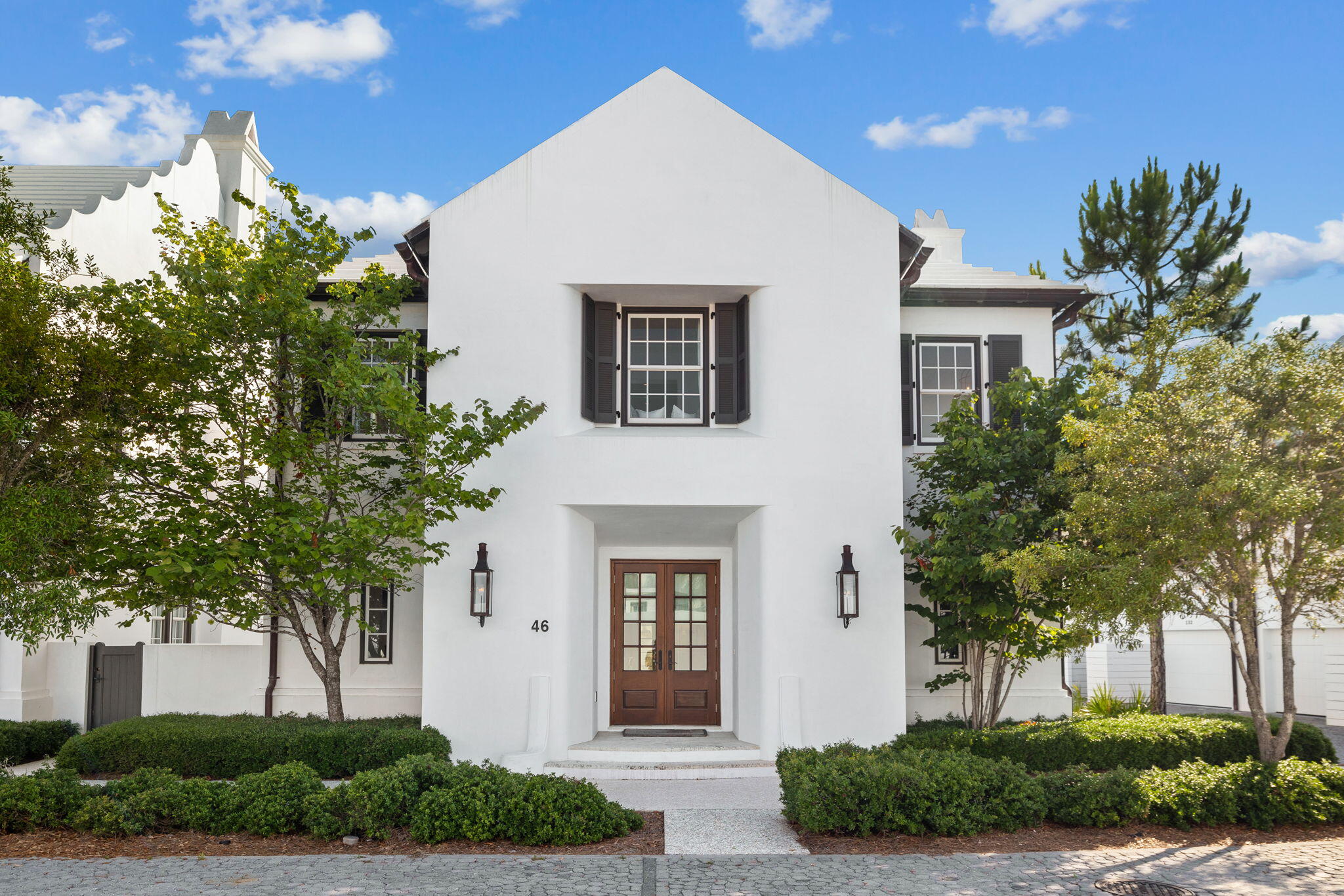 Erected in 2015 with the finest materials and fortified masonry structure, this Alys Beach residence evokes grandeur and architecture reminiscent of the Greek Islands while remaining geographically poised in one of the most exclusive and sought-after communities along 30A. Designed by the acclaimed team at T.S. Adams and executed by Alys Beach Construction, this Somerset Home encompasses over 3,400 square feet of expertly planned living space spanning two distinct levels seamlessly interconnected by a full-service elevator.

Approached by the handlaid cobble-stoned road and gas-lantern lit entry, the residence is situated on a prime corner homesite offering heightened privacy with a true detached footprint. Upon initial entry, the main living area is highlighted by meritorious appointments including Venetian plaster, Dominican shell stone flooring throughout the first level, and varying width rough sawn oak flooring throughout the second level.

Configured with entertaining in mind, the gourmet kitchen includes custom cabinetry, an expansive island with integrated seating, an adjoining wet bar area, and a luxury appliance suite with Thermador refrigeration, range, and coffee system. Blurring the line between indoors and out, the living areas provide direct access to the intimate courtyard and loggia with private pool, outdoor kitchen, and a covered outdoor living area with fireplace. A two-car garage, laundry suite, half bathroom, and built-in home office area complete the first floor.

Located on the upper level, the main suite with wood-adorned panned ceilings boasts a sitting area, morning kitchen, and a sumptuous ensuite with dual vanities, an oversized walk-in wardrobe, wet room, and water closet. Lined with windows and overflowing with natural light, the second-floor breezeway leads the way to the three additional guest suites with private ensuites and walk-in wardrobes.
 
Alys Beach residents will experience unparalleled amenities within the community,  including the exclusive Alys Beach Club with breathtaking views and fantastic outdoor dining experience. The Caliza Pool, Restaurant and Lounge. Zuma Wellness & Fitness center offering spa services, tennis, pool, yoga, personal training and more. Not to mention the nature preserve, numerous restaurants, boutiques, green spaces, parks, and pedestrian paths throughout the community.
