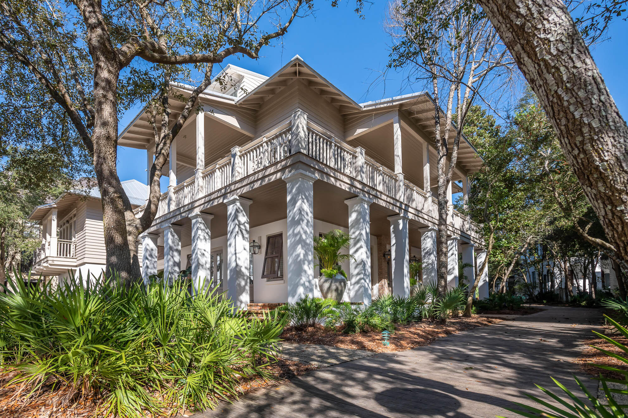Located just steps to the center of town on a large corner lot. Well-maintained, turn key six bedroom home with a third floor office nook. The spacious courtyard is complete with a large pool, outdoor shower, fireplace and plenty of room for relaxing or entertaining. The first level's three bedrooms all have en suite baths and French doors leading to the wrap around porch. The second and third levels are accessible by the beautiful stairs or the elevator. The second level's open floor plan has large living / dining area and a large gourmet kitchen with twin dishwashers, ice maker and wine fridge. The carriage house has been upgraded to a primary suite by connecting to the living room with an interior h The third level has another bedroom and bath with an office area and access to the roof top bird's nest with beautiful views over Rosemary Beach to the Gulf of Mexico. An amazing perch for sunsets. Just seconds to the shops and restaurants in the center of town. A short stroll down the boardwalk to the sugar white sands and emerald waters of the Gulf of Mexico. Perfect as a full-time residence, second home getaway or a great rental investment.