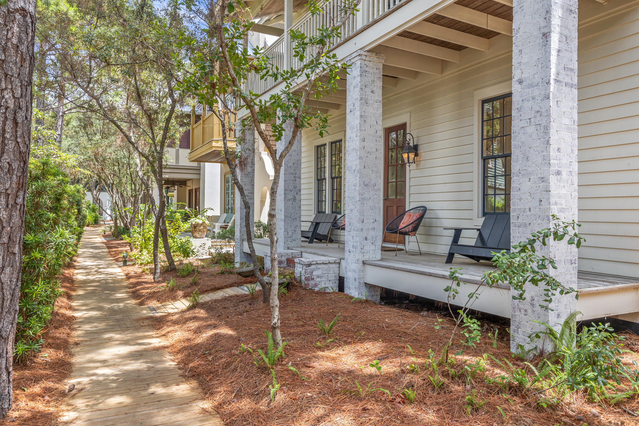 This exquisitely charming cottage nestled in the idyllic and highly desirable Coastal Community of Rosemary Beach offers 3 bedrooms and 3 baths and two separate living areas. This lovely property is situated on a tree-lined Boardwalk , mere steps from the vibrant town center and just minutes to the pristine beach. The French door courtyard entryway invites you into a tranquil haven, adorned with soothing earth tones and beautiful oak floors. The comfortable seating area is perfect for unwinding after a day of enjoying the beach.This delightful parkside cottage boasts a chef-style kitchen, thoughtfully designed with ample pantry storage, island seating for four, and a spacious dining area, all seamlessly integrated into the open floor plan. The first floor also features an additional living area with a gas fireplace, providing a cozy ambiance. A queen bedroom with an adjoining bath, complete with a walk-in shower, is conveniently located on the first floor. 

Ascending the staircase, you will find the second floor, where the king master suite awaits. This elegant retreat includes an ensuite bath and a private balcony overlooking a quiet winding boardwalk. Across the hall, the third bedroom offers both a full and twin bed, with an adjoining bath featuring a tub-shower combination. With its host of special features and prime in-town location, this charming cottage is quintessential  Rosemary Beach at its best.  

There is parking for two vehicles under the pergola which could be turned into a carriage which has written approval from Rosemary Beach Architectural Committee. All information contained in this listing is deemed to be correct, but should be verified by buyer.