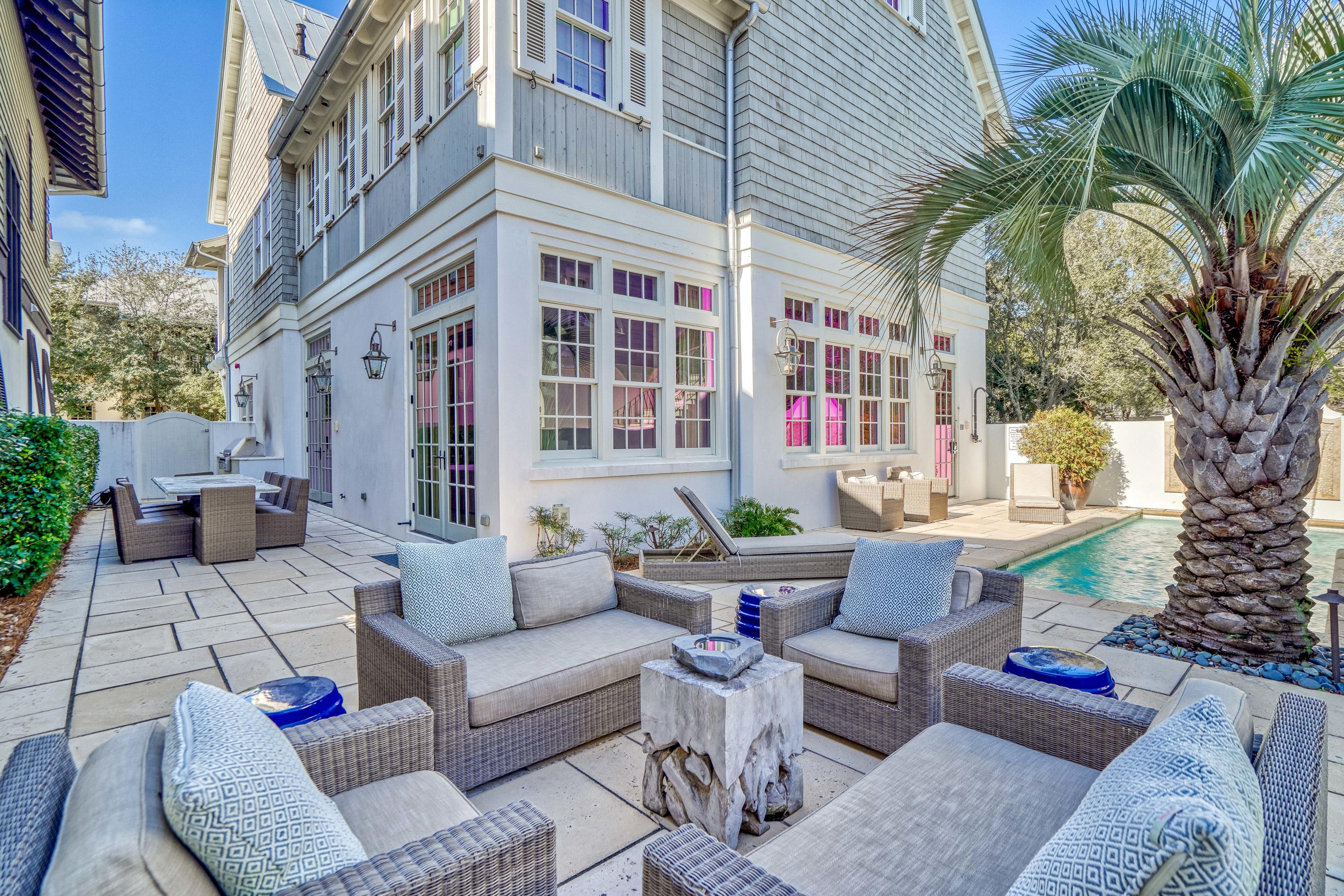 STEPS TO THE BEACH, 'Serendipity' is THE Premier Vacation Home in Rosemary Beach, FL. Rental income surpassed $436K in 2021 and has $218K booked in 2022 (so far)! Located South of 30A & just a short stroll to the shimmering turquoise waters of the Gulf of Mexico; relax in luxury resort style w/ a PRIVATE COURTYARD, HEATED  POOL, fireplace & outdoor dining for 10. Truly an OASIS FOR FAMILY LIVING! This elegant home has a MASTER SUITE ON THE 1st floor, another LAVISH MASTER SUITE on 2nd floor, & 2 guest suites. The 3rd floor has a bunk room, game room, & theater! A spacious carriage house apartment over 2 car garage provides additional sleeping quarters. STUNNING interiors have new living room furnishings, venetian plaster walls, reclaimed wood beams, and marble/limestone kitchen & baths.  Information contained within this listing, such as square footage, is deemed to be accurate but is not guaranteed. Buyer to verify