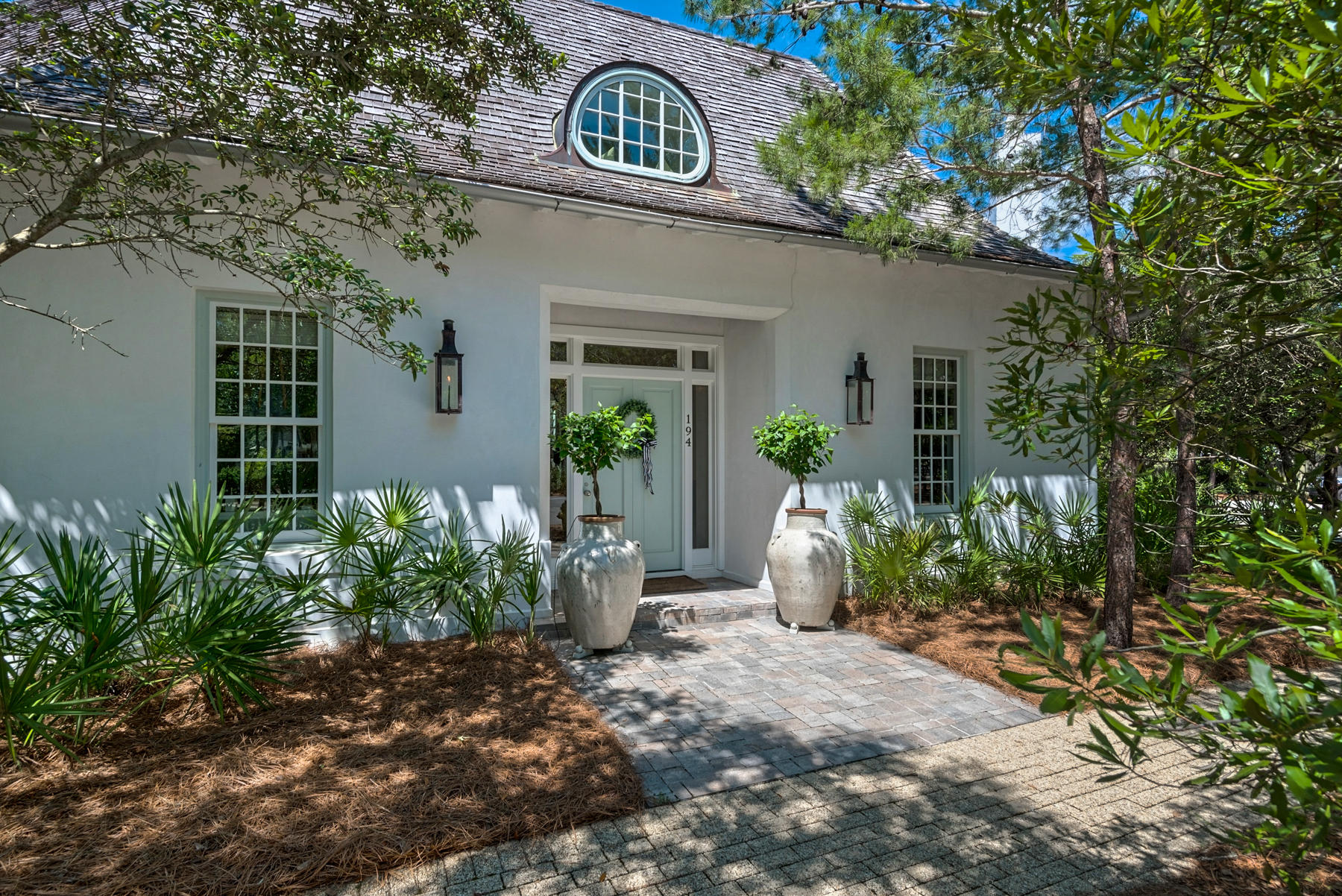 This one of a kind 2012 Coastal Living Magazine ''Ultimate Beach House'' is on the market! An incredible 2 story home that has amazing interior & exterior features for the whole family & has never been on the rental market. Has high end finishes that includes 4 bedrooms with ensuites, 4 bed bunk room, 6 bed bunk room, 2 more full baths, 3 half baths, features large closets, additional storage spaces, laundry room on each level, 3 separate living rooms, office space, spectacular home theatre with mini kitchen, game room, man cave & bar, air conditioned 2 car garage with large screen TV & builtin speaker/entertainment system for karaoke/dance party, home generator, impressive private courtyard that has summer kitchen & stunning 50' pool. Privately situated on one of Rosemary's largest lot. Beautifully decorated, still includes many styles from the original "Ultimate Beach House" design with some gorgeous upgrades. It uniquely offers a complete first floor living layout, with the master bedroom & ensuite and 2 bedrooms with their full baths on the first floor along with the kitchen, dining area, living room, plus more. This amazing home features 2 builtin wall iPads for home control and entertainment via speakers concealed throughout the entire house in the walls. This home screams fun & is truly built for living your best life & entertaining! It is just a short walk to Rosemary's shops & restaurants, their multiple beach accesses, fitness facilities, tennis courts, St Augustine Greens & outdoor amphitheater, the Homeowners private pool & Clubhouse, and numerous other green spaces & community pools. Located on the North side of 30A, tucked quietly away from noises & activities  and on the far East end of 30A, allowing easy access to Hwy 98, situated between Destin & Panama City Beach, approximately 15 mins away from either Hwy 331 or Hwy 79 that both go North to Interstate 10, and 20 minutes to ECP(Panama City Beach) airport, 45 mins to Destin Executive Airport, and 75 minutes to VPS(Destin-Fort Walton) airport. There is not much left that this incredible home does not offer or allow access to!