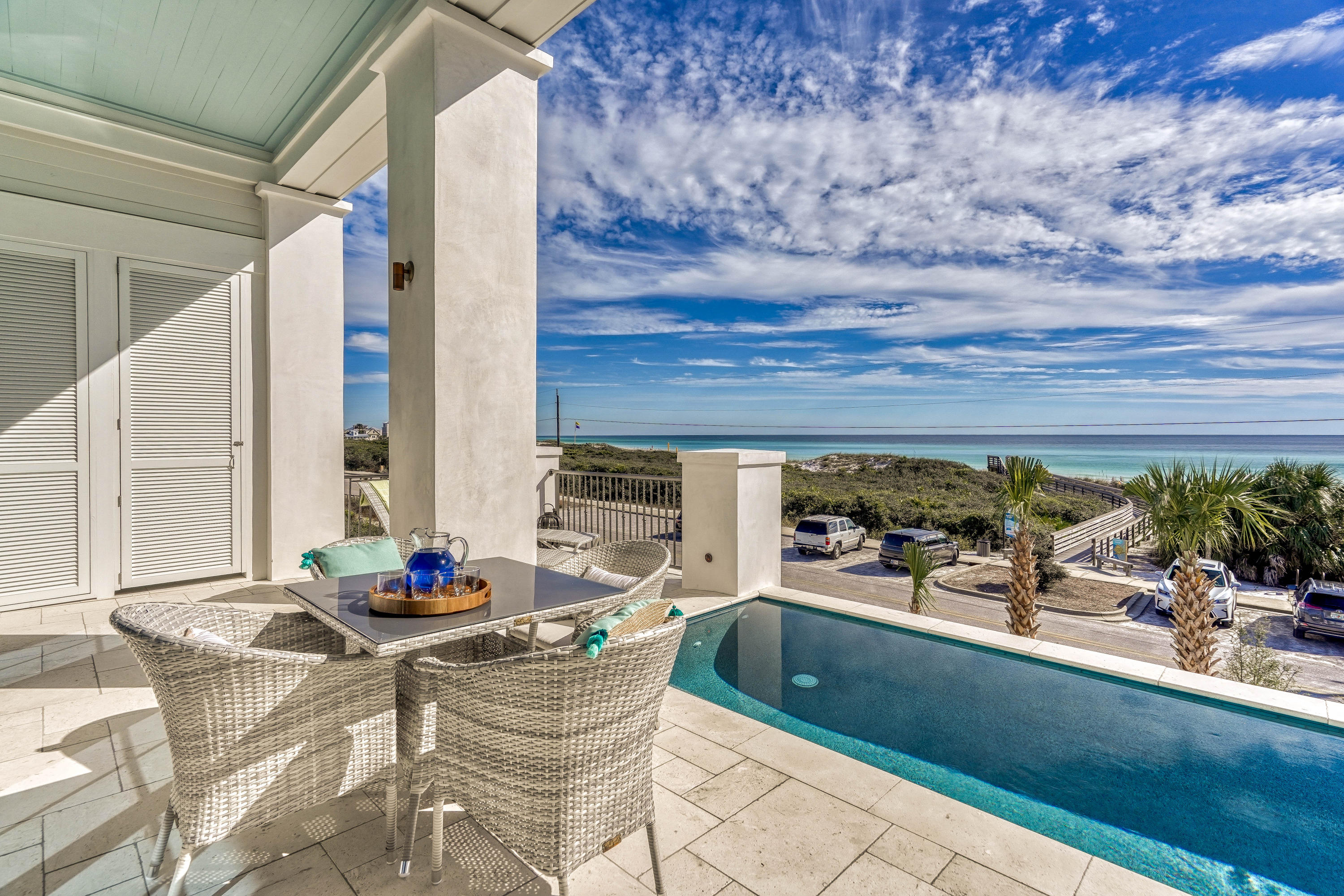 Extraordinary brand new home with carriage house, 2nd level gulf-front pool, and breathtaking gulf views that are forever protected by the state preserve land in front.
From the moment you step foot into 434 W Park Place you'll see that not a single detail was spared in these luxurious finishes.
The first floor has 3 total bedrooms, one of which is a king master suite with private balcony.
There is also a kid's room with 2 twin beds and it's own ensuite bath and another guest room with 2 full beds plus ensuite bath and has it's own private balcony.
The first floor also has a beautiful elevator that services all 3 floors, a full-sized laundry room with a washer and 2 dryers, another full bath that is perfect for rinsing off after coming in from the beach... plus an outdoor shower conveniently hidden and tucked just outside the exterior side door. 

Continuing on to the 2nd level you'll notice the incredible attention to detail in the gorgeous wire-brushed style flooring, remarkable shiplap covered walls, and LED lighting throughout the stairwell.

The 2nd level is home to the living space, dining area, kitchen, and wet bar, all of which is wide open and inviting and flooded with phenomenal natural light that pours in from the stunning floor-to-ceiling windows and doors. 

Dark wooden beams run the length of the ceiling and contrast beautifully with the soft grays and whites of this space. 

The kitchen is stunning and boasts quartz countertops, stainless steel appliances, 2 dishwashers, dual ovens, a six-burner gas range, and a wonderfully appointed large pantry with built-in shelving.
 
Step out onto the balcony and you're greeted by one of the finest examples of 30A living at its highest and most prestigious level. 
Relax in the pool and take in some of the most astounding views in the area as you can see panoramically up and down the emerald coast from this vantage point. 

The pool is equipped with spectacular lighting that is user-controllable and gleams as beautifully at night as in the day. 

Also on the 2nd level is a walkover to the carriage house which is fully appointed with it's own full kitchen, living space, washer and dryer, bedroom with stunningly beautiful bathroom, plus a private balcony with gulf views. 

Carriage house can be conveniently entered from the main house or from its own private entrance adjacent to the garage.
 
Moving on to the 3rd floor you'll find the true master suite and another guest master suite plus a thoughtfully placed wet bar with coffee maker, refrigerator, and ice maker all elegantly hidden behind beautiful cabinetry.

The master is enormous and is complete with a sitting area and 2 sets of French doors that lead out onto the balcony where some of the most captivating and magnificent views on 30A await. 

The master bath is as elegant and impressive as the rest of the home and includes a large glass-enclosed shower with dual shower heads and fantastic tile work. 

The guest master suite has its own ensuite bath, king bed and private access to the 3rd floor balcony and it's spectacular views. 

Other outstanding notes on this home are a tremendous garage with 2 full-sized car doors plus a golf cart bay, a SONOS sound system throughout, a large lot with significant driveway space for parking cars, and a beach access walkover located directly across the street. 

Home is positioned on a dead-end street so through-traffic is minimum. 

Less than 5 minutes from Rosemary Beach by car, bike, or golf cart.
 
Because of the protected state land in front, this home is essentially a gulf-front property without the gulf-front price tag at under $1000/ft. 

Would make a phenomenal investment as a vacation rental or the perfect primary or 2nd home.  

If interested, call 30A Escapes Realty today for a private exclusive tour.