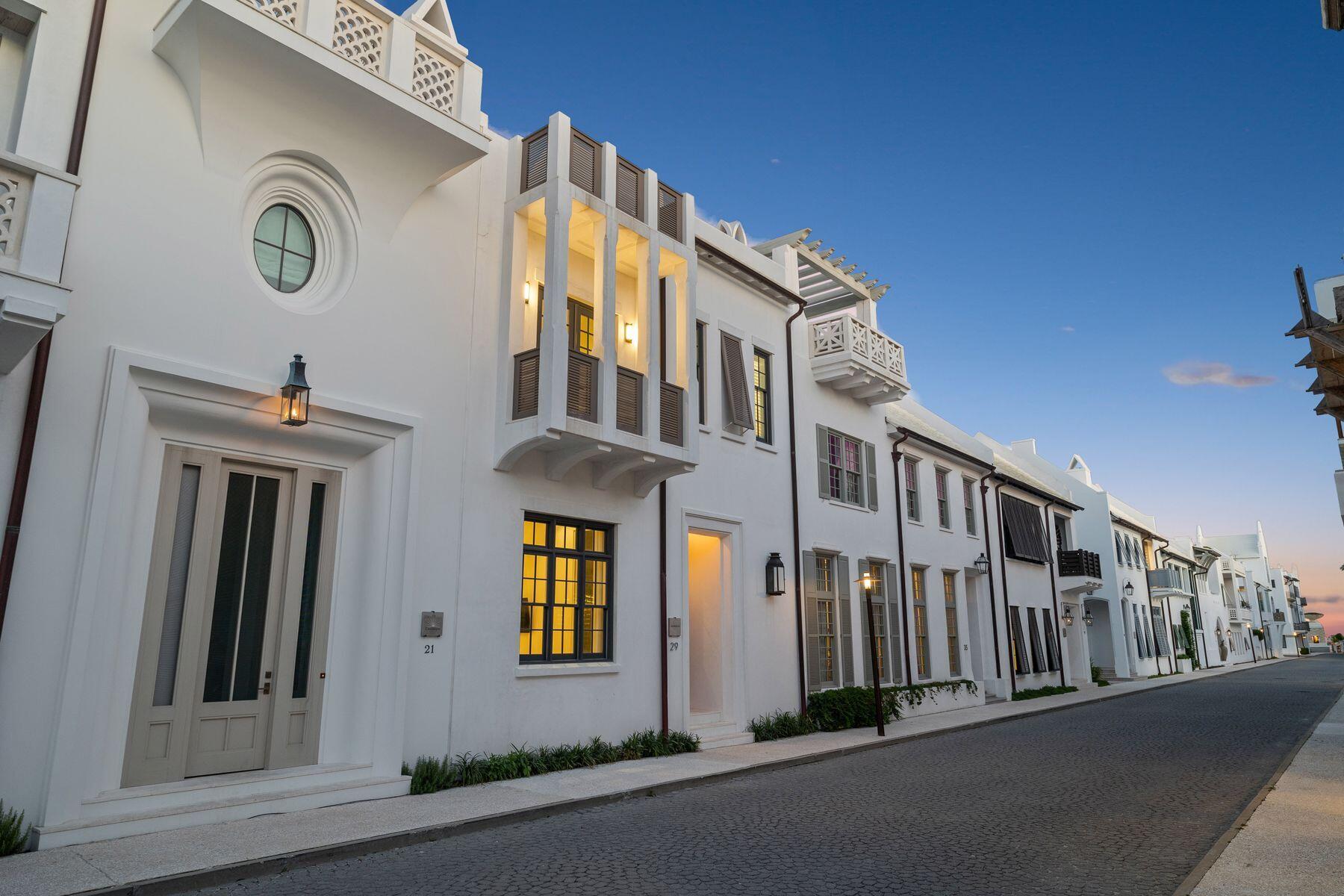 Situated on one of the most iconic and sought-after streets in Alys Beach, this exquisite residence has just completed a full remodel by the renowned team at Summer House, blending sophisticated design with timeless coastal charm.

Originally designed by the celebrated Domin Bock Architects, this bespoke townhome features a highly efficient and thoughtfully designed floor plan, offering a seamless flow between living, dining, and outdoor spaces. The architecture exudes a distinctly Venetian influence, with its arched balcony, divided-light windows, and rich dark wood accents lending it a striking and refined curb appeal. Inside, the newly reimagined interiors are warm and elegant, with rustic ceiling beams, artisan Venetian plaster walls, and a curated selection of textures and finishes that create a sense of understated luxury. The home's layout offers multiple indoor and outdoor living areas, perfect for both relaxed everyday living and effortless entertaining.

A wall of sliding glass doors opens to a serene private courtyard, enclosed by Alys Beach's signature white walls. Here, a tranquil pool and gentle water feature offer a peaceful escape just moments from the vibrant town center, beach access, boutique shopping, and world-class dining.

This is a rare opportunity to own a fully renovated, move-in-ready home in one of 30A's most prestigious communitiesoffering the perfect balance of architectural character, modern design, and unbeatable location.