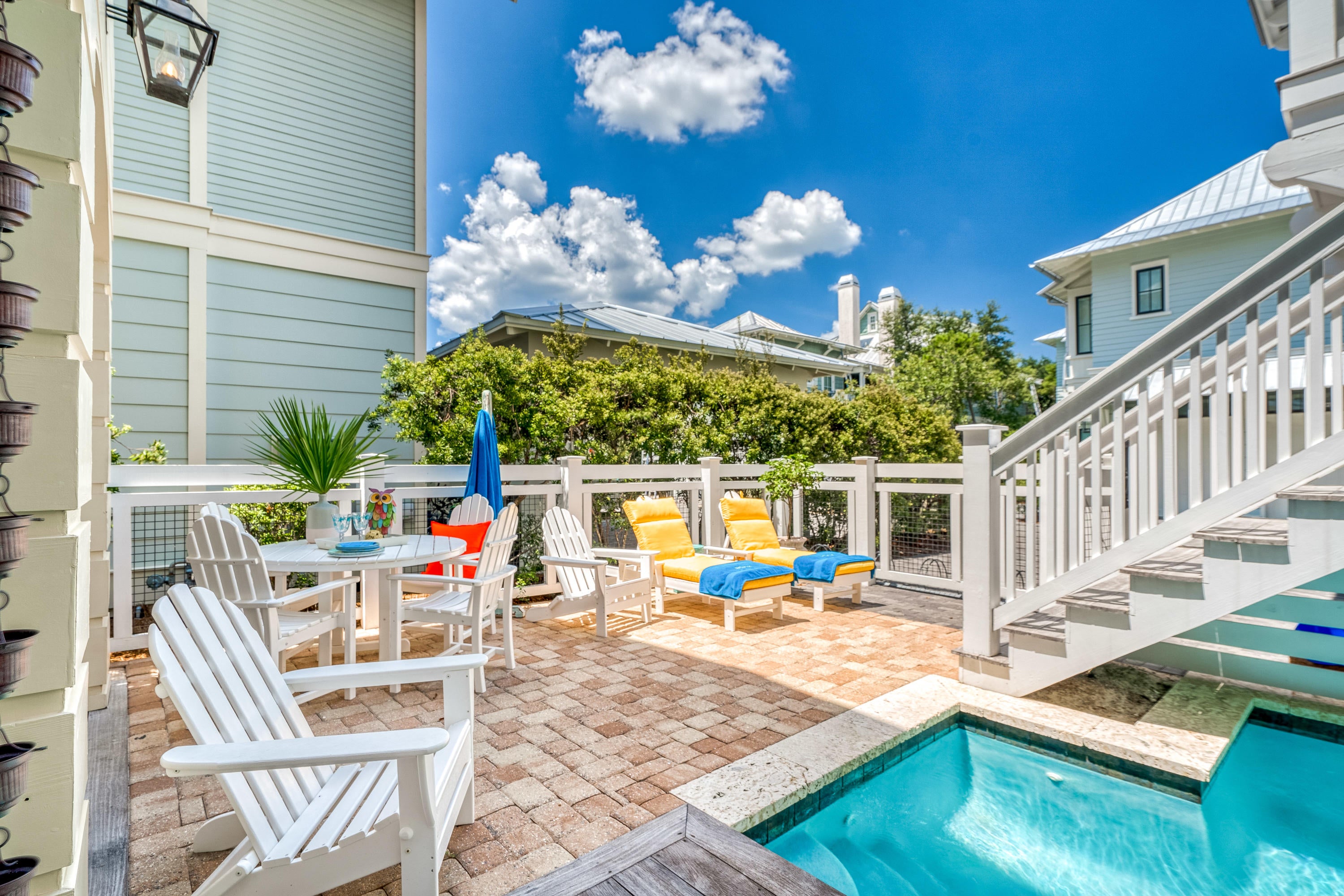Can you Say Wow! This stunning 6 bedroom plus 2 bunks, 6.5 bath home with a Home Theater and Exercise room is located in the coveted Phase 3 of Watercolor Just steps from one of the many walking paths and access points to the Coastal Dune Lake. Relax in the back yard using your own private pool that is connected to the grilling porch complete with an ice maker fridge and pool shower.  3 Levels of exquisite decorating using Venetian plaster, painted brick, Pecky cypress and designer lighting.    Brand new kitchen with custom cabinets, Revenna marble backsplash, Quartz counter tops plus a 48' subzero refrigerator.     Open Kitchen, Living Room and Dining room complete with a Justin Gaffrey one of a kind painting the owners commissioned just for that space. Truly the kind of finishes you would expect in a coastal retreat.  First Floor and Second Floor Master Bedrooms with loads of closet space.  Each Bedroom has its own private bath and access to an outdoor porch.  The architect, Blu Line Studio, did not leave any details out of this three-story masterpiece.  

Fireplace nestled in the center two story impressive living room with an outdoor fireplace just steps from the pool.  Light a fire outside and sit while listing to the sounds of a waterfall.  Study/office on the first floor and 3 laundry areas throughout the house.  Hardwood floors on all three levels and the carriage house.  2 car garage and plenty of outdoor porches and balconies grace this family home designed for entertaining.  Carriage house can be accessed from ether the ground floor stairs or through the main house on the second story.  

The recently installed state of the art security system with thermostats and cameras are easily accessible by phone or iPad. Enjoy the best quality sound with your wireless Sonos in the living room, master bedroom suite and in the grill porch area. Whether you are looking for an exceptional rental investment or beautiful vacation home, this meticulously maintained property is sure to impress.