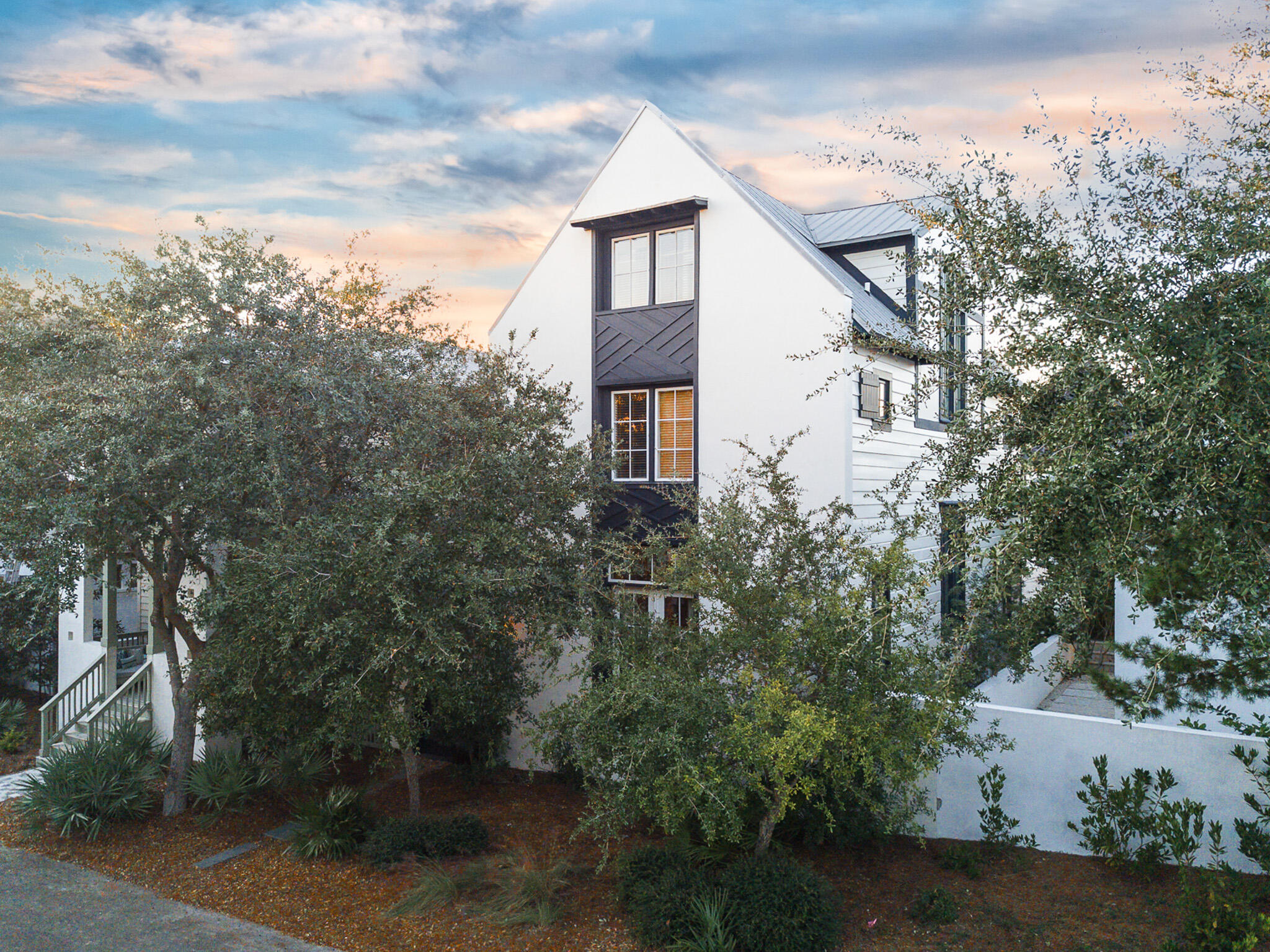 Welcome to 182 E Kingston Road, an exceptionally-maintained property in the heart of Rosemary Beach. This beautiful home; which features 4 bedrooms, 4 bathrooms and 2,214 square feet, is the perfect place to relax with family and friends. This quintessential beach cottage also features hardwood floors throughout, 12 foot ceilings, a screened-in porch overlooking the pool, an iron railing staircase, multi-zone HVAC, newly painted exterior and plenty of space to build a carriage house. 

The first floor features an open-concept living/ dining space, which boasts a beautiful kitchen with a gas range, stainless-steel appliances, quartzite countertops, glass tile backsplashes, all tastefully decorated with a sleek, coastal decor.