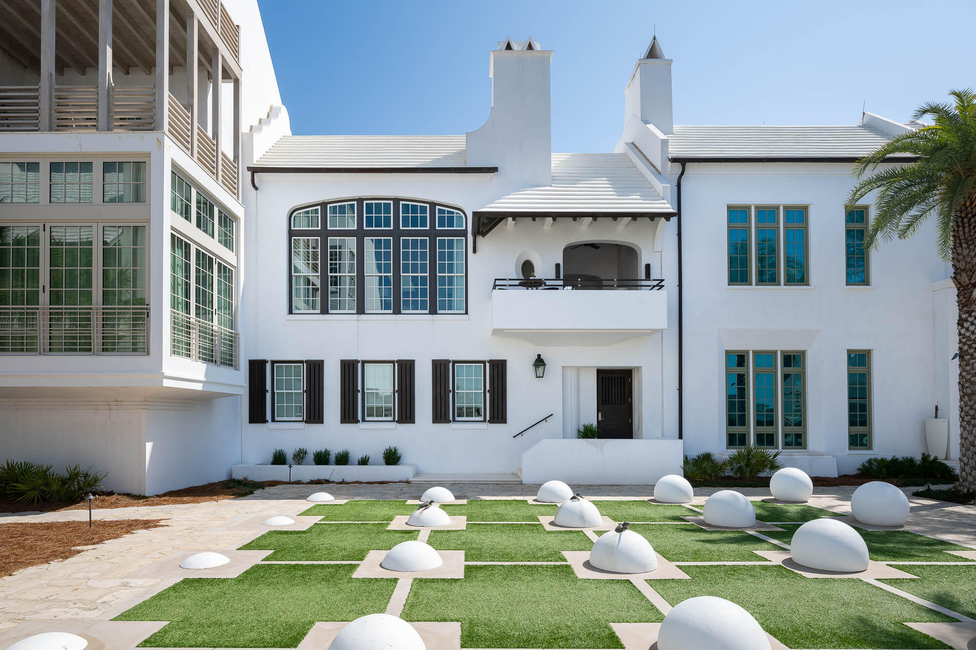 Life is defined by the new home offering of 32 Kings Castle Court located south of Scenic Highway 30A.  This custom home is aligned on the iconic Turtle Bale Pedestrian Path leading to the Gulf of Mexico.  Architect Gary Justiss' talents provided harmony in design capturing this four-bedroom home's livability & interconnected private outdoor amenities.   

The main living level is an entertainer's dream featuring 3 distinguished outdoor amenities which include a swimming pool with sunning deck, a screened patio loggia featuring a summer kitchen to dine al fresco, capped with a second-floor balcony loggia overlooking Turtle Bale Pedestrian Path.  This loggia provides views of the western sunsets furnished to relax in front of the outdoor fireplace & TV.  A combination of French Doors & bi-folding door systems bring the indoors & outdoors together.  

The primary bedroom suite is an oasis within itself outfitted with custom window treatments, stunning tile & stone work within the bathroom, and a soaking tub cast within a grotto.  Additional, attributes provided are the very generous closet with custom cabinetry that leads into a family office & workout room all contained within the primary's envelope.

Each of the 3 guest bedrooms offers en suite bathrooms, beautiful custom built-in cabinetry in addition to walk-in closets.  Each bedroom offers the desired comfort & privacy for your guests.  

32 Kings Castle Court consists of all met needs for an Alys Beach homeowner.  This property is a must see.