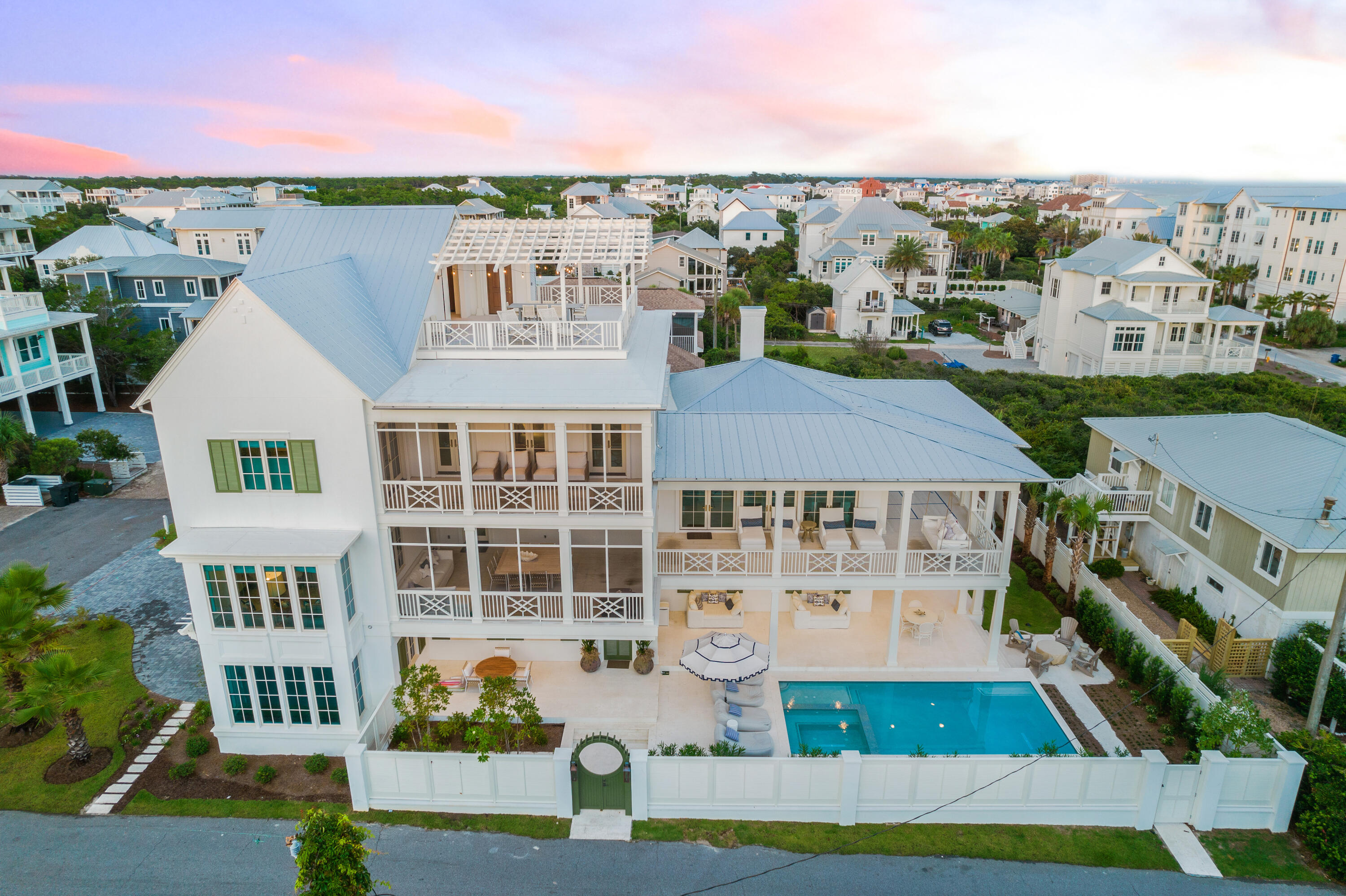 Welcome to 16 Kirkwood Place, a brand new build located in the beautiful neighborhood of Inlet Beach on the east end of 30A! This home is situated perfectly right next to Alys and Rosemary Beach, near restaurants, shopping, and live entertainment. And, every necessity and amenity is only a short bike ride or stroll down 30A. Filled with high-end furnishings this home is perfect for both couples and larger families, and would make an excellent primary home or even a lucrative vacation rental! Breathtakingly beautiful, this 6 bed, 6 bath home features stunning, forever Gulf views and a rooftop deck. 
Located on a larger lot, the home offers a luxurious, sprawling almost 7,000 square feet. Upon entering the first floor, you are serenely welcomed with hushed tones of Cobalt blue, white, and gray. Perfectly mimicking the Gulf waters, which are visible (and stunning) from the rooftop deck, this home continues to perfectly encapsulate the beach lifestyle with every luxurious detail. The first floor also features a bedroom and full bathroom, perfect for visiting family. 
Heading upstairs, you will find the main living space situated on the second floor. A crown jewel of the home, the living-dining space looks out over the gorgeous water with floor-to-ceiling windows. The space is decorated in shades of neutral tones and features a cutting-edge kitchen with stainless-steel appliances. The master bedroom is also located on the second floor, with a gorgeous, full master bathroom. A bunk room is located on the third floor, as well as an additional two bedrooms. 
But the crown jewel of the home is absolutely the stunning rooftop deck. This expansive sundeck looks out over the Gulf, which features stunning FOREVER emerald-green views. Start your mornings with a cup of coffee under the beautiful latticework, or end your day with an evening cocktail while watching the summer sunsets. Don't hesitate to schedule your showing today at this BEAUTIFUL new property in Inlet Beach.
