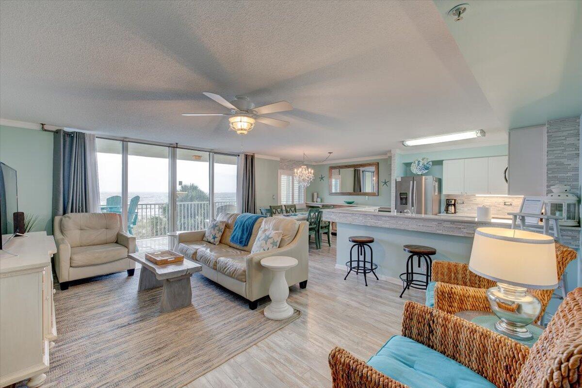 MUST SEE this updated GULF FRONT condo. Straight on views of the pool, beach and Gulf of Mexico... Close enough to hear the surf! Beautifully decorated in ''modern coastal chic'' decor with designer touches throughout. Living room features floor to ceiling doors and windows, w/sliders opening to 8x12 Gulf front balcony. Master bedroom features large walk-in closet and side window. Master bath features separate shower and whirlpool tub. Property amenities include a heated pool, poolside restrooms,wooden walk-over to beach and two outside showers. 2021 gross income nearly $59,000!