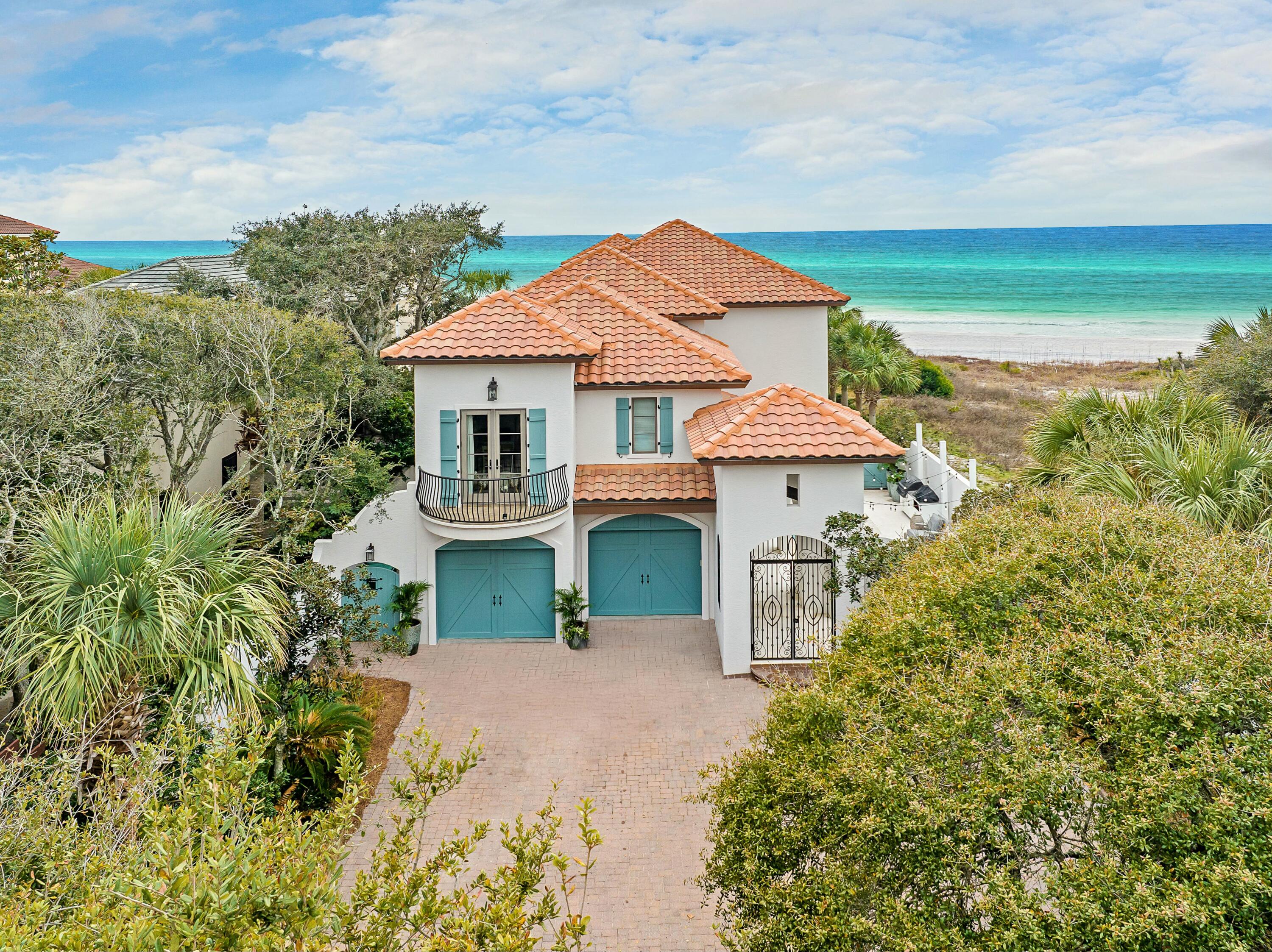 A rare opportunity in exclusive Shell Seekers Cove, this stunning five-bedroom, five-bathroom gulf-front villa offers the ultimate in coastal luxury. Spanning 4,452 square feet on a generous 0.38-acre lot, this exquisite home is a true beachfront sanctuary, where timeless architecture meets modern innovation.  

Enter through a charming courtyard framed by graceful arches and gas lanterns, where a tranquil pool and fountain set the tone for relaxed coastal living. Inside, an open-concept design showcases breathtaking gulf views through expansive walls of windows. Chiseled stone floors, coffered ceilings and a fireplace create an inviting living space, while the gourmet kitchen features premium appliances, ample counter space and seamless flow to the dining area. The second level offers two luxurious master suites with private balconies overlooking the gulf  perfect for soaking in the sea breeze and endless sunsets. Two additional ensuite bedrooms provide comfort for guests or family. Throughout the home, thoughtful details shine, from intricate ceiling designs to impact-resistant glass windows and doors.  

With modern technology at its core, the home has geothermal heating and cooling and a whole-home natural gas generator for energy efficiency and peace of mind. Outdoor living is effortless, with expansive covered patios, a private boardwalk leading directly to your secluded beach, and endless space for entertaining.  

A two-car garage adds convenience, while the private pool and no HOA restrictions make this property ideal for use as a primary residence, vacation home or luxury rental. Located moments from Gulf Place and the best of 30A's dining, shopping and activities, this villa offers coastal elegance and modern comfort  making every day feel like a getaway.