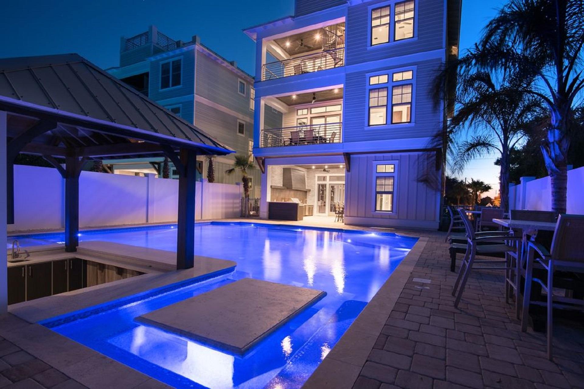 This unprecedented luxury beach house offers exceptional investment opportunity with gross rental income history-YTD 2021-$388,770+, 2020-$277,645, 2019-$407,309 and 2018-$370,451. This contemporary coastal designed home is perfectly situated in Crystal Beach and provides striking gulf views. Unparalleled amenities include a Watermark built 60,000 gallon private resort style pool, complete with an expansive outdoor living area, sunken swim-up bar with a large flat screen TV, adjoining in-pool spa, concrete picnic table, and outdoor summer kitchen area. This home was perfectly designed to maximize functionality, cascading natural light, and chic contemporary finishes, while affording optimal comfort and living space. The exclusive property boasts of 5,889 square feet across three levels, featuring multiple indoor areas, outdoor living areas, fourth floor rooftop observation deck, private commercial grade elevator, dual master suites with spectacular gulf views, custom built-in bunk beds, eight-zone audio sound system throughout, security camera system, and security-code keypad front entry system. The first floor is laid out with a spacious bunk room, full size laundry area and large bedroom with en suite bath, as well as a game room complete with a custom built boat bar, pool table, built in wet bar, and full size stainless fridge. The second floor is the scenic point of the indoor living space, complete with a voguish contemporary living room featuring pecky cypress ceilings in the living room, floor to ceiling windows providing natural light throughout with captivating gulf views, a built-in entertainment center with floating shelves that is open to the kitchen & dining room, providing an open and functional flow. The kitchen is stunning and features floor-to-ceiling custom cabinetry, Sub-Zero appliances, Wolf professional series gas range, ample storage and is anchored by a massive center island crowned with gorgeous quartz countertops. The second floor also features two full bedrooms with en suite bathrooms, a convenient half bath and access to the second story outdoor dining area that overlooks the resort style pool. The third floor features three full bedrooms, including dual master suites with spacious covered porches, a laundry area, bunk room. This Crystal Beach home has multiple beach access points only steps from the home and is centrally located to Destin's world class fishing, boating, golfing, dining, shopping & entertainment.
Note: Current Vacation Management Company will manage the property for the remainder of 2021 for only 10% management fee & all bookings will transfer to new owner from the day of closing and on including no linen start up, all VRBO / Airbnb & etc., reviews & pictures will remain with the new buyer.
Check out the VRBO link here...https://www.vrbo.com/1119376?noDates=true