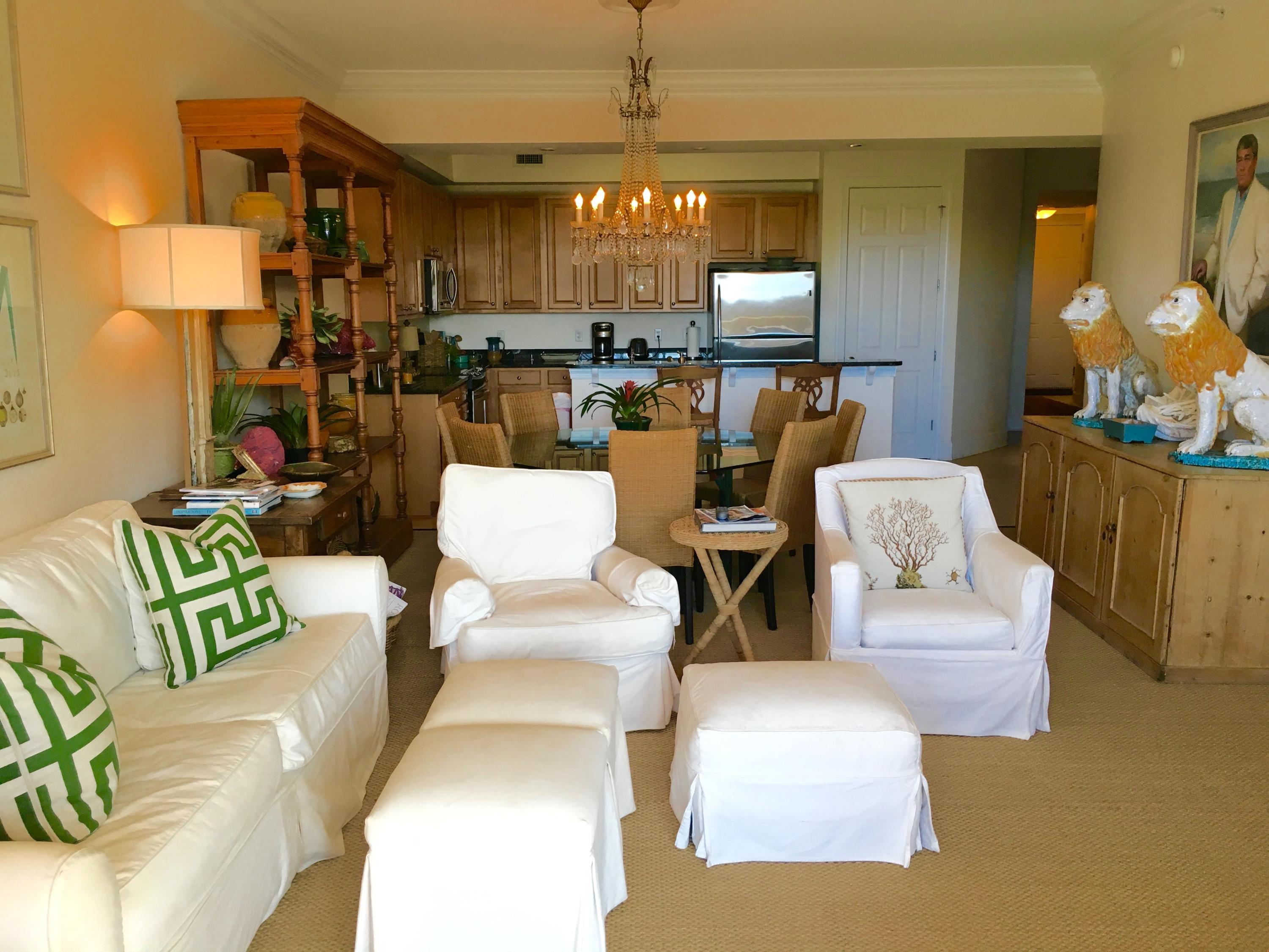 This stunning second floor unit is accented with all the luxury's a beach home can imagine. The large spacious open kitchen and living with 10ft ceiling and large balcony boast small views of the lake. The large master suite and bath have separate access to balcony as well. The master bath has a double vanity seperate whirlpool tub and shower. The luxury chef kitchen is equipped with granite counter tops and stainless steel appliances. This unit is sold mostly furnished with some exclusions. Do not miss the opportunity to own this incredible unit!!! Buyer to verify all dimensions.
