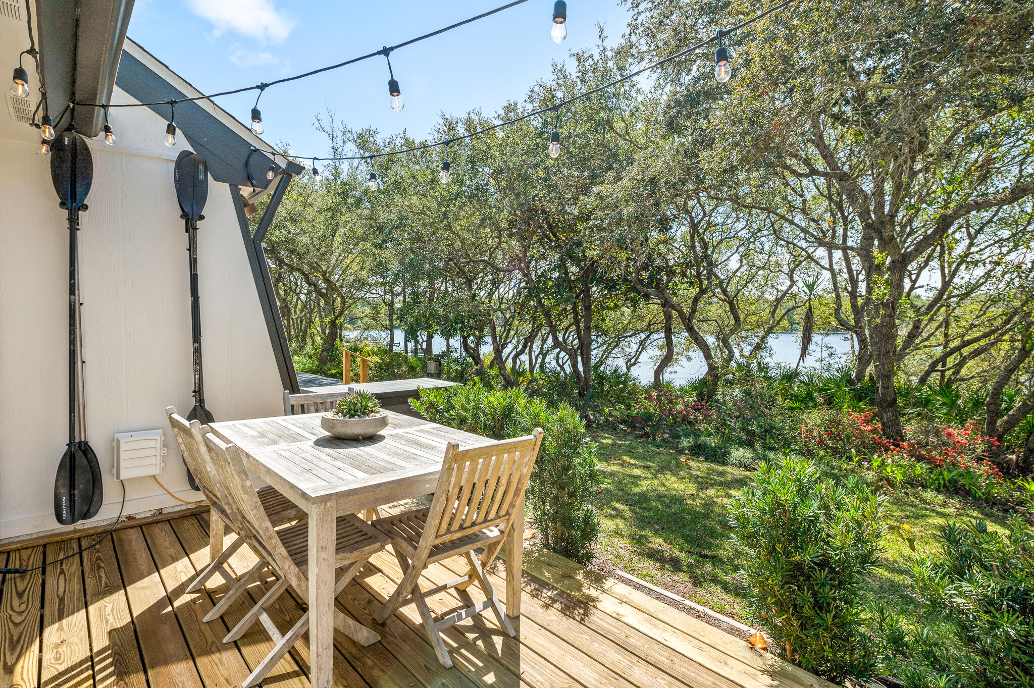 Tucked along the shores of Camp Creek Lake, this fully renovated two-story one bedroom, one and a half bathroom home offers a thoughtfully designed living space in a truly unique coastal setting. Over $90k in proven rental income. This light-filled and cheery ''casita'' is nestled on a quiet street between Watersound and Alys Beach. This unique home also offers fast access to pristine, white-sand beaches. The main level features an open kitchen and living area filled with natural light, while the upstairs hosts a spacious bedroom and full bathroom.

Enjoy tranquil lake views from the home and take advantage of direct access to the community dock--ideal for paddleboarding, fishing, or simply taking in the peaceful surroundings. With its rare lakefront location and convenient proximity to the best of 30A, this home presents a compelling opportunity for those seeking a coastal getaway or low-maintenance residence in a sought-after area.