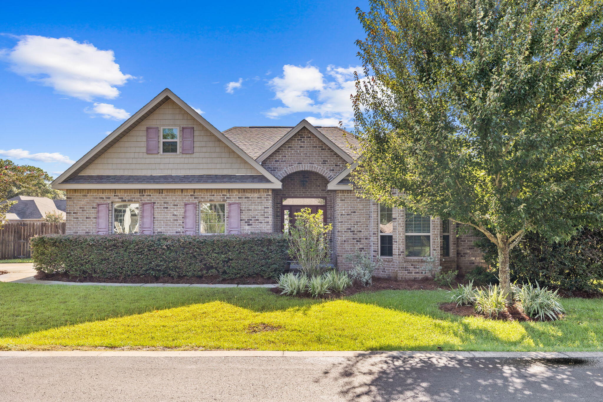 Located in the highly desirable and family friendly neighborhood of Peach Creek, this Graham floor plan is a four-sided brick home that offers a grand entry with beautiful archways leading you into a bright and open living space. With new interior paint throughout, the home provides 3 bedrooms, all of which were freshly re-carpeted. The spacious master bedroom is highlighted by tray ceilings, walk-in closet, and a master bathroom complete with his & her vanities, walk-in shower and separate garden tub. Ideal for entertaining, the open living and kitchen area flows seamlessly into the backyard space with a covered porch, elevated deck with built-in seating and a brick paver patio complete with a firepit. 

Peach Creek is notorious for being a family friendly neighborhood with an unmatched sense of community. Holidays are celebrated and food trucks are frequently making appearances in the common area. Ideally located, Peach Creek is in close proximity to all that 30A has to offer, and is just minutes to Dune Lakes Elementary, Emerald Coast Middle School and South Walton High.