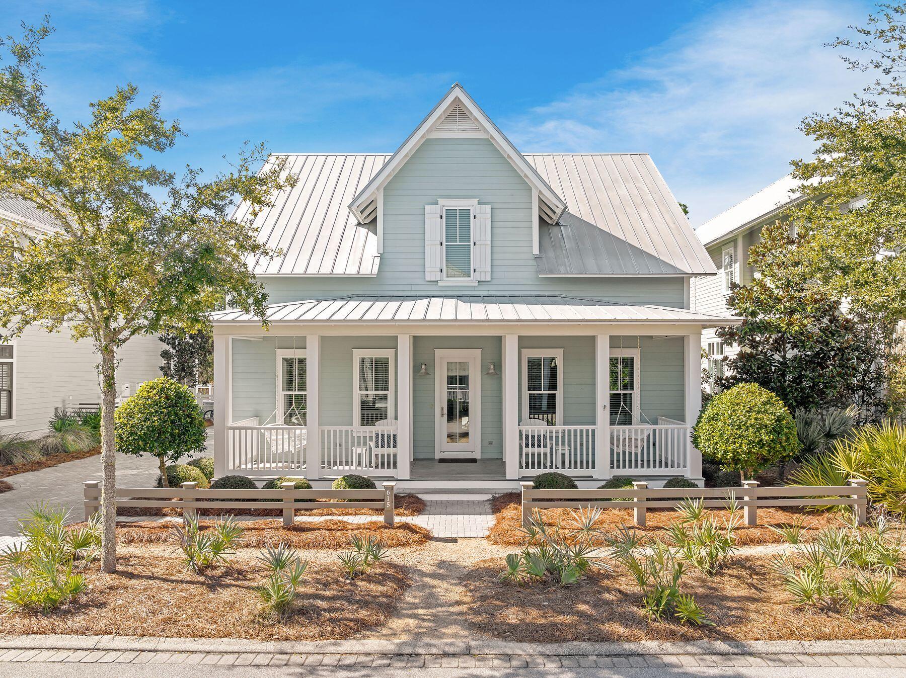 A sense of calm settles in the moment you arrive at this beautifully crafted custom home, set in a quiet pocket of WaterColor where privacy and proximity coexist with ease. Backing to a lush nature preserve and thoughtfully positioned away from through traffic, the home offers a peaceful daily rhythm while remaining just minutes from everyday conveniences, the beach, and Camp WaterColor's resort-style amenities.
Built by Huff Construction and meticulously maintained, the residence reflects pride of ownership at every turn. Natural light pours through an abundance of windows, illuminating sun-bleached, stone-washed oak floors and a layout designed for both comfort and connection. The main level features a generous primary suite and a guest bedroom, each with its own ensuite, providing flexibility for owners and visitors alike. Upstairs, three additional bedrooms include two ensuite guest rooms and a charming bunk room with built-ins for four, ideal for hosting family and friends.
An expansive upstairs living space currently serves as a playroom and gathering area, complete with custom built-in bookcases that add both function and character. The chef's kitchen anchors the home with top-grade granite countertops, high-end GE Monogram appliances, and a wet bar with a U-Line wine cooler, making entertaining feel effortless.
Outdoor living is equally considered. A large screened porch with a gas fireplace overlooks the preserve, offering a quiet place to unwind year-round, while the adjacent open deck with a natural gas hookup invites easy grilling and relaxed evenings outdoors. The fenced backyard includes dual gates for convenient access and a secure space for children or pets. An enclosed outdoor shower with endless hot water, bike racks for up to six bikes, and a welcoming front porch with two three-seater swings complete the lifestyle-driven details.
Modern comforts include dual 18-SEER HVAC systems; dual Rheem tankless water heaters; impact glass windows and doors; dark gray slate tile in the sand room, laundry room, and half bath; and an extra-long garage with room for a vehicle and golf cart.
This is a refined yet inviting home that pairs custom craftsmanship with a serene setting, offering full access to WaterColor's renowned amenities while feeling like a true retreat at the end of the day.