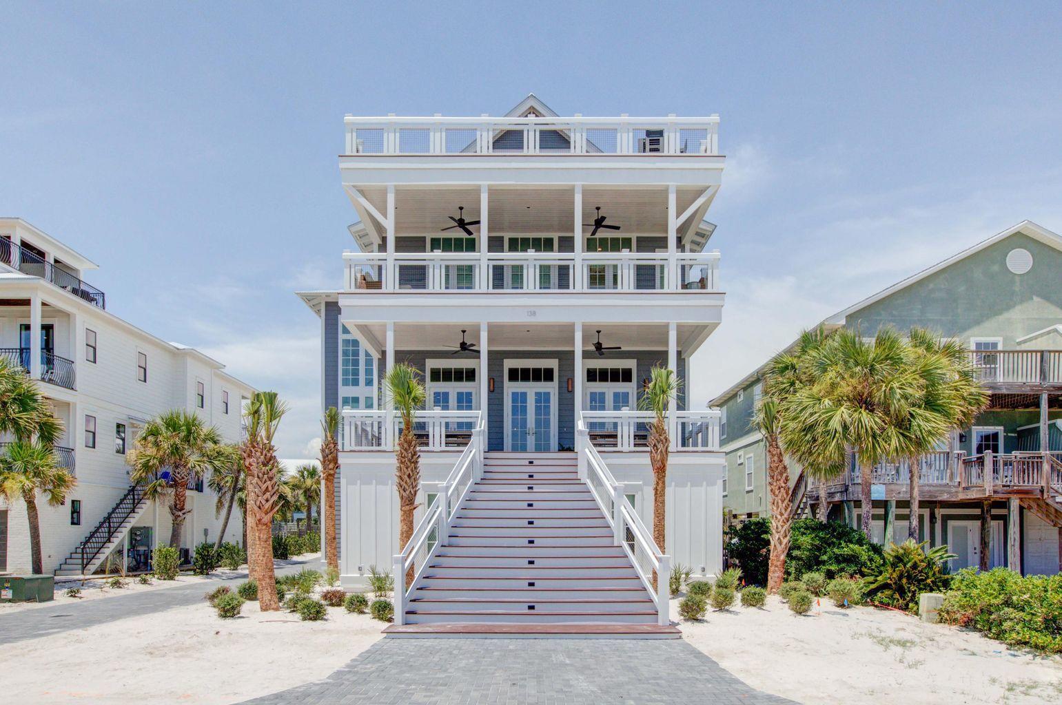 Experience the ultimate vacation experience in this uniquely designed beach sanctuary! Incredible gulf views from both the second, third, and forth floors of the property offer the opportunity to enjoy the beautiful emerald waters right from your own porch. Astounding architecture paired with a flawlessly planned floor plan create space for large gatherings of families and friends to experience a true 30A retreat. Features of the property include a grand great room with dining for the entire party, a breath-taking 4th level sky deck, a large private pool, incredible outdoor living, parking for over eight vehicles and much more. Step into the first floor of the property to find a space created for the kids in the family as well as the as the young at heart. This floor contains a separate kid's living area which includes space for a large TV, huge sectional, pool table, and additional gaming space. The recreation room seamlessly lives with the outdoor entertaining area boasting a large resort-style pool. Additionally on the ground level, there are 2 large bunk rooms, each sleeping 10. Each bunk room has its own locker room style bathroom boasting a large triple vanity and 2 shower stalls in each. The first laundry room can also be found here off the living area.

As you climb to the second floor you will be welcomed by the amazing gulf views and bright sunlight in the grand stairwell. This floor holds the main living space as well as a huge dining area offering room for the entire family to gather for dinner. You will find a wet bar containing a bar sink, under-counter fridge and ice machine off the dining for convenient access. From the dining space move across the open concept to the amazing chef's kitchen. No amenities were missed in this kitchen! The huge living space is located across from the kitchen and offers a wonderful area for the family to enjoy time together. Furthermore on this floor, you will locate 2 king suites, each with private bathrooms and balconies overlooking the pool.

The third floor of the property showcases the astonishing master suite, 2 additional junior suites and a third bunk room. The master bedroom and bathroom each boasts a private balcony offering breath-taking views of the gulf, a large walk-in shower, free-standing tub, and separate vanities. On this level, you will also find the second full size laundry room here for easy access to all guests. Two additional full sized bathrooms are located on this level.

The outdoor living space at 176 E Park Place is incomparable! With beach access right down the street from the front door you will be enjoying the white sand and emerald waters within minutes from leaving the house. Back at the property, the private pool creates its own sanctuary!  In addition, right off the pool you will find an amazing outdoor kitchen. There is also a private outdoor shower off the back of the main house for after beach showers. Additional outdoor recreational space can be found behind the property. A large privacy fence borders the entire outdoor space. Finally in addition to the garage space, the property offers parking for at least an additional 6 vehicles.

Features of the property include an elevator; white oak flooring throughout; marble in many of the bathrooms; quartitze countertops in the kitchen; beautiful lighting; incredible plumbing fixtures; amazing tile on the back-splashes and bathrooms; 3 tankless hot water systems; a metal roof; and much more! The property offers sleeping for 30 in beds with an additional 6 in queen size pull outs, for a total of 40. A full listing of the property specs is available upon request. Do not miss your opportunity to own the ultimate vacation rental, you will not find another property like this in our area!

*Finished photos are the same floor-plan built in another location.