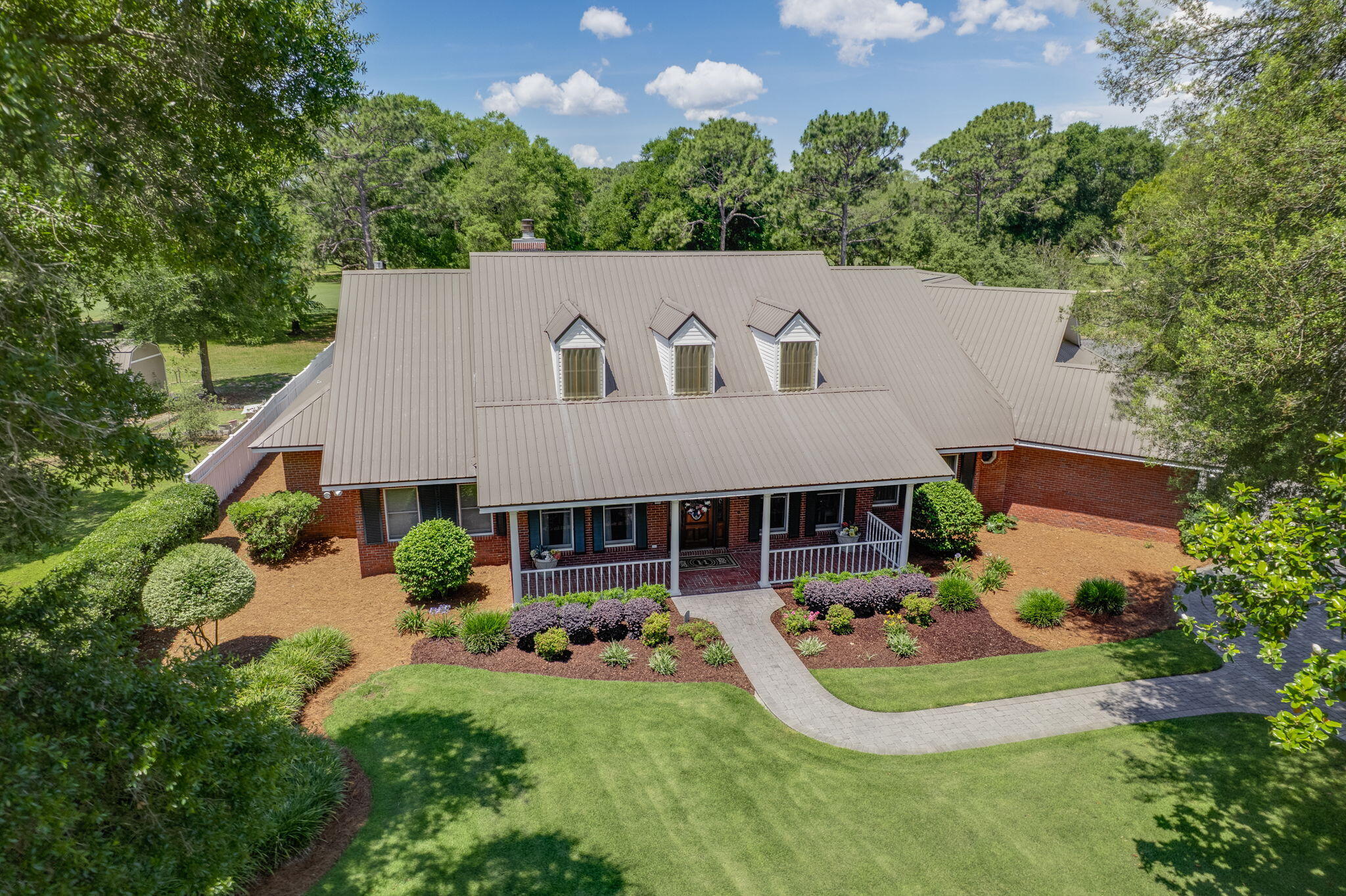 **Stunning Home on Rocky Bayou Golf Course - Your Private Oasis Awaits!**

Welcome to 1129 Forest Road, a spectacular residence nestled on the serene landscape of the Rocky Bayou Golf Course, offering unparalleled luxury and comfort. This magnificent 3-bedroom, 3.5-bathroom house boasts over 4,000 sq. ft. of heated and cooled space designed for both relaxation and entertainment. 

Step into your dream home through the elegantly designed entrance with custom cut glass wood Entry doors and be captivated by the airy, sunlit spaces created by Anderson windows and doors throughout. The Formal living area features a Coffered Celing and floor to ceiling windows, gas fireplace, providing warmth and ambiance for cozy evenings spent with family and friends. **Gourmet Kitchen & Dining:**
The heart of this home is undoubtedly the gourmet kitchen, equipped with Kitchen Aid appliances, a Sub Zero refrigerator, 5 Burner gas cooktop, dual ovens, and Wet Bar with ice maker. Perfect for entertaining, the kitchen flows seamlessly into the formal dining room, where gourmet meals can be enjoyed. 

**Outdoor Paradise:**
Step outside to your private outdoor oasis, complete with a heated pool and luxurious jacuzzi, perfect for unwinding after a long day. Host unforgettable summer barbecues using the built-in outdoor gas grill, and enjoy the convenience of an irrigation system on well to keep your landscaping lush and inviting. 

**Unmatched Comfort & Security:**
This home is designed with comfort in mind, featuring a 5-zone HVAC system by TRANE to ensure a perfect climate year-round. With additional perks like a tankless water heater, a whole house water filter, and a transferable termite bond, you can enjoy peace of mind in your new sanctuary. 




**Additional Features:**
"	10k Gas Generator
"	45 Solar Panels-American Made in Georgia
"	House/Lot located on Rocky Bayou Golf Course (#7)
"	Heated Pool with Jacuzzi
"	Bar w/Ice Maker and Wine Cooler(holds 220 bottles+)
"	Metal Roof
"	Anderson Windows and Doors
"	3 Car Garage
"	Heated and Cooled Storage room in Attic
"	5 Zone HVAC(TRANE)
"	Security System with 4 Cameras
"	Kitchen Aid Appliances plus Sub Zero Refrigerator
"	Tankless Water Heater
"	Dual Ovens
"	Two Gas Fireplaces
"	3M Coating on Windows
"	Pool Table-Custom 
"	Large Primary Closet
"	Underground Safe
"	Built-in Outdoor Gas Grill
"	Irrigation System on Well
"	Whole House Water Filter
"	Six Ft. Closet in Garage
"	Jacuzzi Bath Tub in Master
"	Termite Bond Transferrable
"	Carpet Concession with Acceptable Offer
"	New Pool Fence with 10 yr Warranty
"	Brick Paver Driveway, Sidewalks & Patio




- A spacious primary suite offers a large walk-in closet, Fireplace and a luxurious jacuzzi bath, creating a true retreat within your home. 
- The attic includes a heated and cooled storage room, providing ample space for your belongings.
- Entertain effortlessly with a custom pool table and Wet Bar with Ice Maker Wine Cooler that accommodates over 220 bottles of wine.
- The property is complete with a new pool fence that comes with a 10-year warranty, ensuring safety for your family and guests.
-Close Proximity to Publix/Wal-Mart Shopping.
-Open view to Holes 6 &7 on RBCC golf course

**Extras Galore:**
With a 3-car garage equipped with a 6 ft. closet for additional storage, a metal roof for durability, 45 solar panels for energy efficiency, and a comprehensive security system with four cameras, this home combines luxury living with practicality.

Don't miss the opportunity to own this incredible property that offers not only a home but a lifestyle. Schedule your private tour today and experience firsthand the grandeur and comfort of 1129 Forest Road, where every detail has been perfectly crafted for you! 

**Your dream home awaits - act now!**