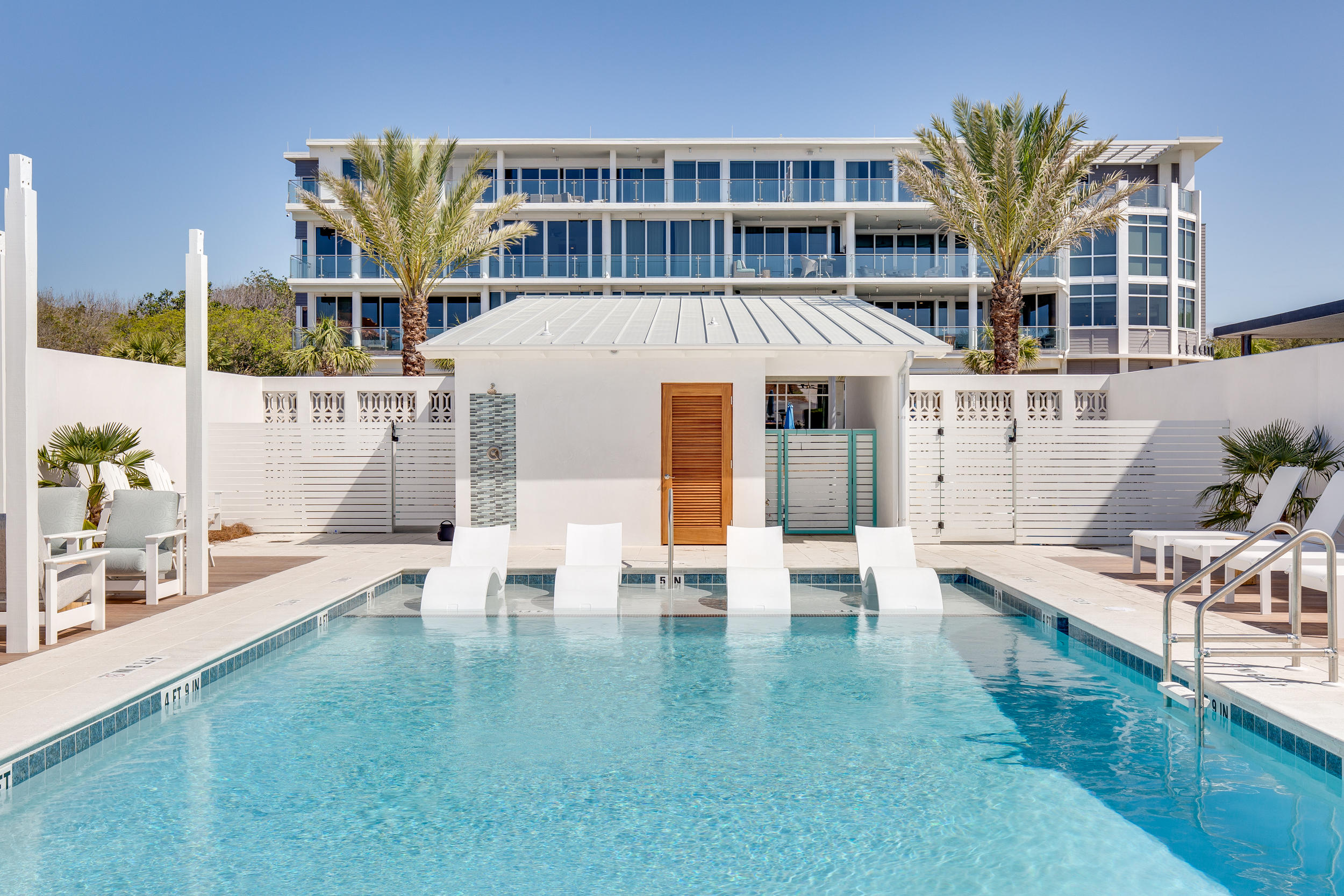 Stunning clean design + gorgeous Gulf views.  Gulf Front Pool Now Complete!  This third floor west corner residence offers a spacious and open living area, massive balcony overlooking 30A and the Gulf, 3 large bedrooms each with their own private bathroom and a full-sized laundry room. Condo will sell furnished and rental ready. This thoughtfully designed floor plan has plenty of room for entertaining friends and family and enjoying the coastal atmosphere from inside or out. An exclusive private beach access, common green space on the Gulfside, and reserved parking spots are just a few of the perks of owning a Viridian Condo. The property is centrally located and is walking/biking distance to shopping, dining and special event This unit is now being sold completely furnished as well as kitchenwares, linens, etc