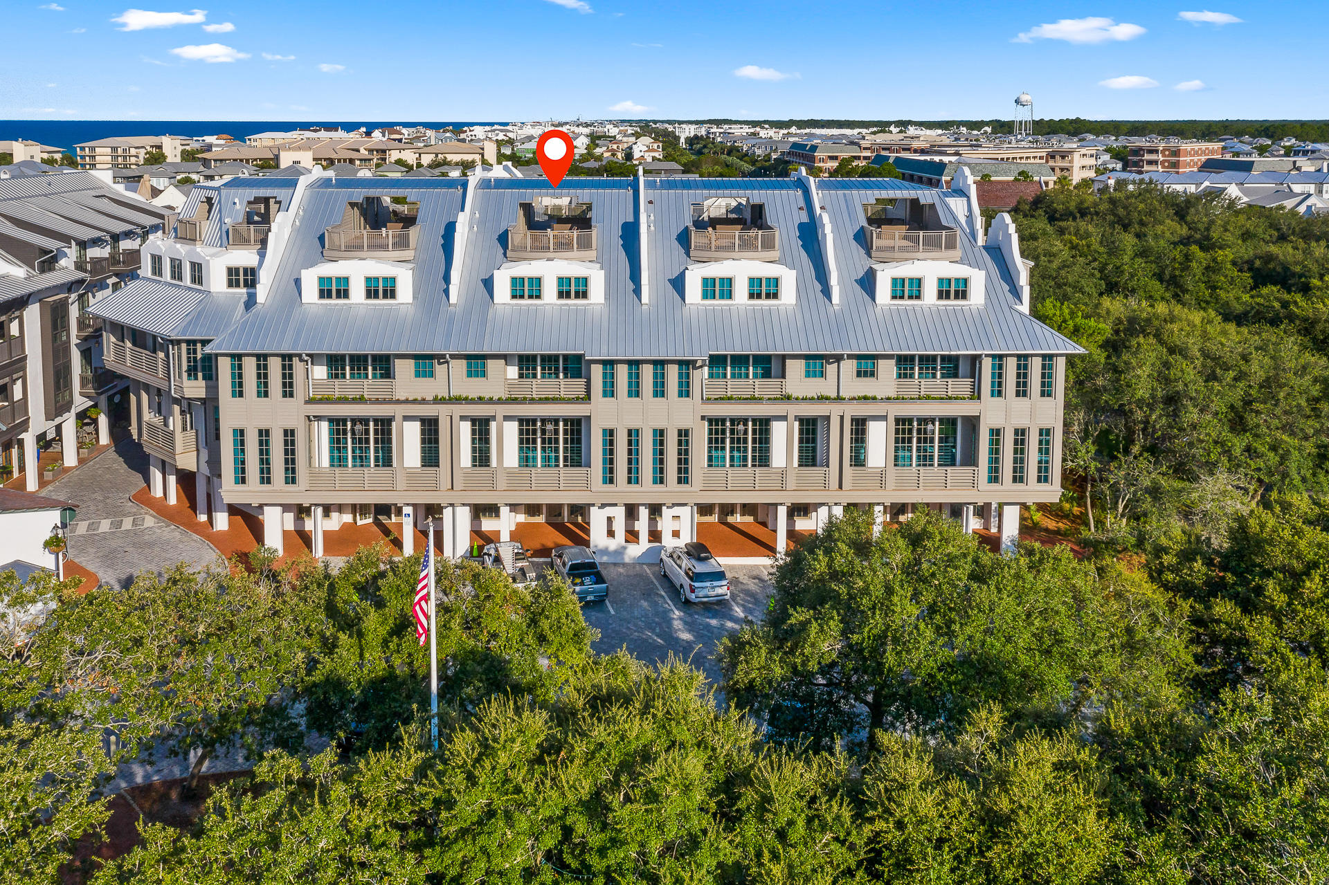Now is your opportunity to experience the newest and most prestigious residences in Rosemary Beach®. Residence 3 at the Providence spans five levels from the ground floor entry, serviced by its own private residential elevator, to the rooftop terrace.
This magnificent, 6,972 square foot residence boasts 5 large bedrooms with en suite baths, 2 bunk rooms that sleep 4, a large, bunk room bathroom and 2 half baths – 1 on the main living floor and a 2nd on the rooftop terrace, as well as 3,226 square feet of outdoor living space.  With an expertly designed floor plan, this residence allows your family and guests to spread out and also reunite on the expansive, second floor living space that features a huge kitchen, two separate living rooms, a dining room, wet bar and butler's pantry. If you require more entertaining space, there is also a private pool and patio with fireplace on this level adjacent to the living space. 

As you enter the residence from the ground floor, you encounter 10' tall French doors, welcoming you into the pristine entry hall.  Overhead is a beautiful and timeless chandelier and you are surrounded by gorgeous, white v-groove wood paneled walls and 8" wide plank, wire brushed European white oak flooring beneath your feet.  You may choose to ascend to the next floor via the private residential elevator or the staircase with handmade iron railings.

Once on the 2nd floor, you are enveloped by a luxurious mix of white venetian plaster and v-groove wood paneled walls, accentuated by 12' ceilings and massive windows with floor-to ceiling custom draperies.  This level is where the family and friends can congregate.  Two separate and distinct living rooms and a dining room with fireplace bookend the massive kitchen.  The kitchen island alone is 18' long, featuring a gorgeous, waterfall Taj Mahal Quartzite countertop, two porcelain Shaw's farm sinks, two Cove dishwashers, a Wolf 24" microwave drawer and seating for seven. The kitchen cabinetry is custom made by Karpaty Cabinets in Atlanta, and the designer used their high-end cabinetry throughout the entire residence.  Built into the cabinetry, a 36" SUB-ZERO integrated over-under refrigerator and freezer perfectly serves the needs and design of the kitchen.  The crown jewel of the chef's kitchen is arguably the 49" Wolf dual fuel range with 6 burners and infrared griddle, and two ovens measuring 18" and 30".  The kitchen is further serviced by a butler's pantry behind the range that features additional shelving space, an additional porcelain Shaw's farm sink and Cove dishwasher.  The butler's pantry is also plumbed for a second refrigerator and oven or other appliances if the new owner so desires. Opposite the butler's pantry and on the other side of the island, you will find a half bath with gorgeous marble counter and Karpaty cabinetry. 

The dining room and living room on the far end of the 2nd floor are accompanied by a wet bar with beautiful dark painted Karpaty cabinetry, a hammered brass drop-in sink by Newport Brass with freshwater filtration system, a 15" SUB-ZERO ice maker, and a 24" SUB-ZERO beverage center.  A porch that spans the width of the living room overlooks the vibrant South Barrett Square of Rosemary Beach.  As you make your way back through the kitchen, you see the inviting and private pool and patio through the 10' tall windows.  The pool deck is covered with Flagstone pavers and offers ample seating and lounging area on all sides of the pool, as well as a fireplace for those cooler nights in the winter.

Ascending to the 3rd floor, you find a bunk room and accompanying bathroom, a large guest bedroom with en suite bath, a laundry room with 2 sets of 27" LG washer/dryer units, and the massive master bedroom suite.  The bunk room provides 4 twin bunk beds and a corner nook for reading, playing video games or watching movies.  The guest bedroom around the corner is large with a king bed, a small, corner space for a desk and porch access. 

The master bedroom suite is luxury at its finest.  Boasting two master baths and closets, as well as a porch spanning the length of the bedroom, you will not want to leave this oasis.  Carrara marble tile is found in both baths from floor to ceiling.  The beautifully stunning Karpaty cabinets in each bath are unique and elegant, offering plenty of space to spread out.  The dual walk-in closets provide ample space for full-time living or the week-long dream beach vacation.

The 4th floor is where you find 3 additional guest bedrooms with walk-in closets and en suite baths, a large den for relaxing and watching television, as well as the second bunk room with 4 twin bunk beds. From this floor, you can access the rooftop terrace by riding the elevator or ascending the spiral staircase off the den.  Once you reach the rooftop, you will understand the concept of "elevated living" in Rosemary Beach.  With its own half bath, mini-wet bar with sink, massive space for seating and congregating, and expansive views of the Gulf from east to west, you will spend countless hours watching sunrises and sunsets from the rooftop while entertaining friends and guests.  

Residence Three at the Providence is a spectacular new opportunity for one savvy investor in Rosemary Beach.
Information contained within this listing such as square footage, is deemed to be accurate but is not guaranteed.  Buyer to verify.