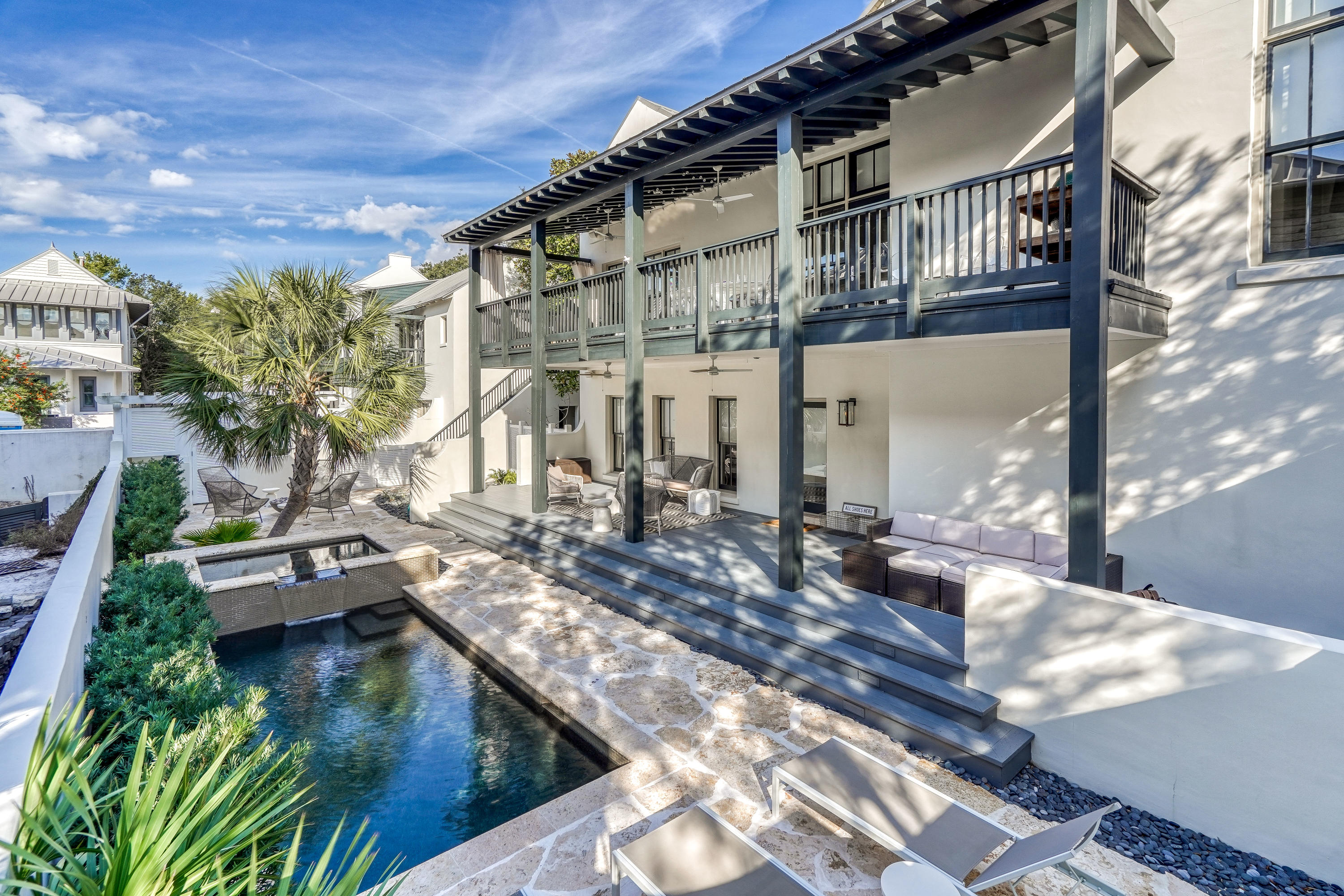 #THECORNEROFUPTOWNANDFUN - GREAT LOCATION This contemporary home has an EXPANSIVE PRIVATE COURTYARD W/ HEATED POOL & HOT-TUB, OUTSIDE FIREPLACE & STAINLESS GRILLING STATION. A HUGE COVERED PORCH overlooks the courtyard & provides OUTDOOR DINING & LIVING SPACE. MASTER SUITE on 1st floor opens onto courtyard, Guest room has en-suite bath on 1st floor & laundry. LIVING/DINING/KITCHEN on 2nd has 14' CEILINGS & FIREPLACE, HEART PINE FLOORS throughout, SIE-MATIC CABINETS, MARBLE countertops, & THERMIDOR range. LOFT BR makes 3rd BR in main house. 480 sf CARRIAGE HOUSE over 2-car GARAGE w/ EZ straight-in entry. #DONTMISSTHISONE
Located in the middle of Racquet Club, Indoor pool, & steps away from the QUIET end of the BEACH. Renovated in 2016, this ''ALYS LOOK'' whitewashed home is like new.