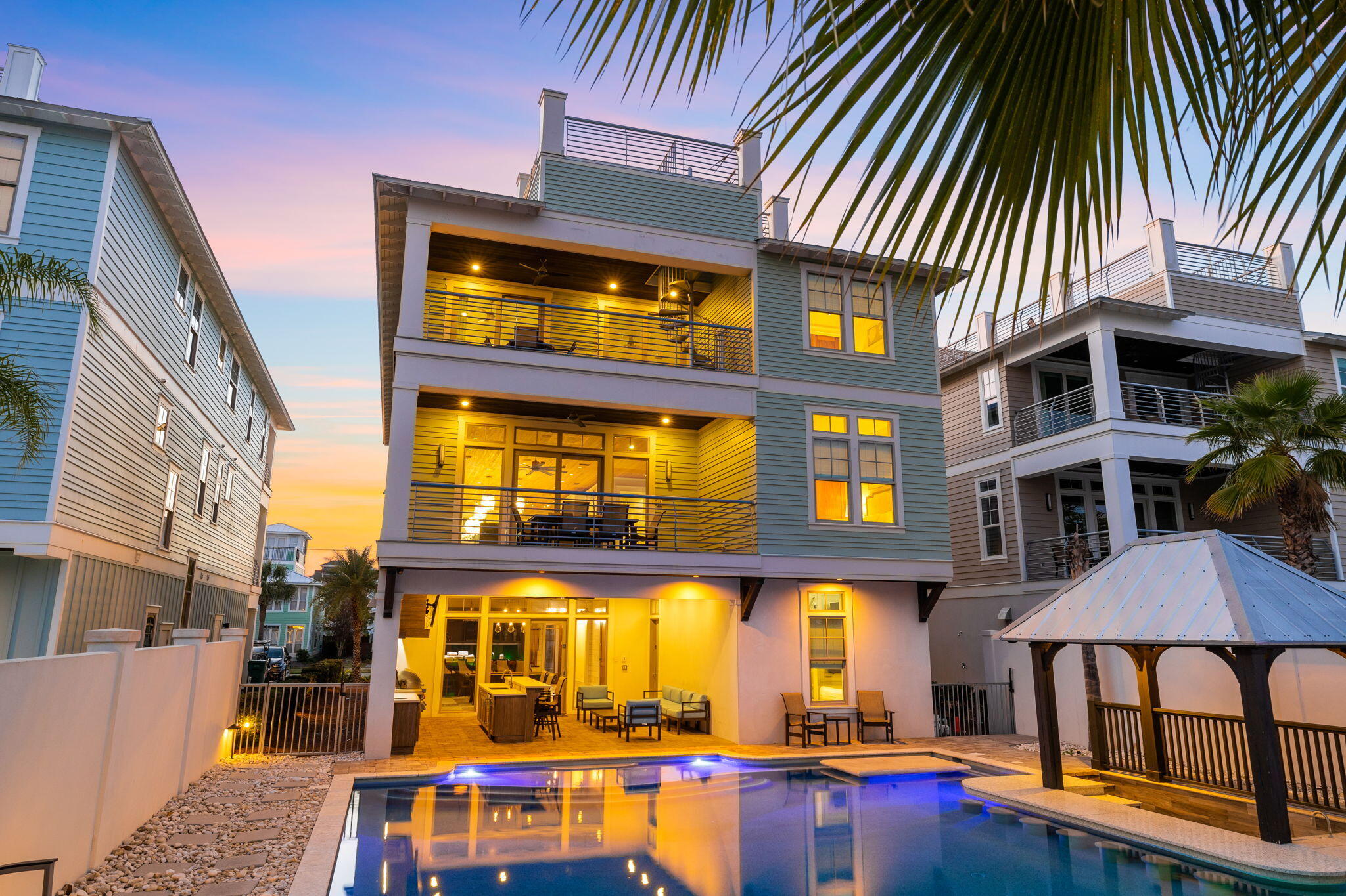 Sleek coastal contemporary design perfectly situated to capture gulf views & masterfully configured providing unparalleled amenities including a Watermark-built 60,000 gallon private resort style pool area complete with a sunken swim-up bar as well as an adjoining spa and tranquil waterfall feature. 

This home was designed to maximize functionality and finely appointed with chic contemporary finishes while affording optimal comfort & living space. Notable features include multiple indoor and outdoor living areas, private commercial grade elevator, dual master suites with gulf views, built-in pinterest worthy bunkbeds, indoor and outdoor surround sound system as well as security cameras for optimal privacy. The first floor layout boasts a spacious bunk room, full size laundry area, large bedroom with ensuite bath as well as an industrial style game room complete with an incredible custom built boat bar, pool table & built in wet bar including a full size stainless fridge.

The second floor is the focal point of indoor living space with a sleek contemporary living room featuring pecky cypress ceilings, floor to ceiling windows to soak in natural light & gulf views, built-in entertainment center with floating shelves and open to the kitchen & dining room for optimal flow.

The ample sized kitchen features floor-to-ceiling custom cabinetry, Sub-Zero appliances and Wolf professional series gas range, ample storage and is anchored by a massive center island crowned with gorgeous quartz countertops. The second floor also features two full bedrooms with ensuite bathrooms, convenient half bath as well as access to the second story outdoor dining area overlooking the lagoon style pool.

The third floor features three full bedrooms including dual master suites with spacious porches, laundry area, bunk room as well as a fourth story viewing deck to maximize the incredible gulf and western oriented views that surround this prestigious home. Crystal Beach owners enjoy multiple beach access points steps from the home and centrally located near Destin's world class golfing, dining, shopping & entertainment.

Please reach out to us today for the cost-to-own and rental projection figures for the property.
