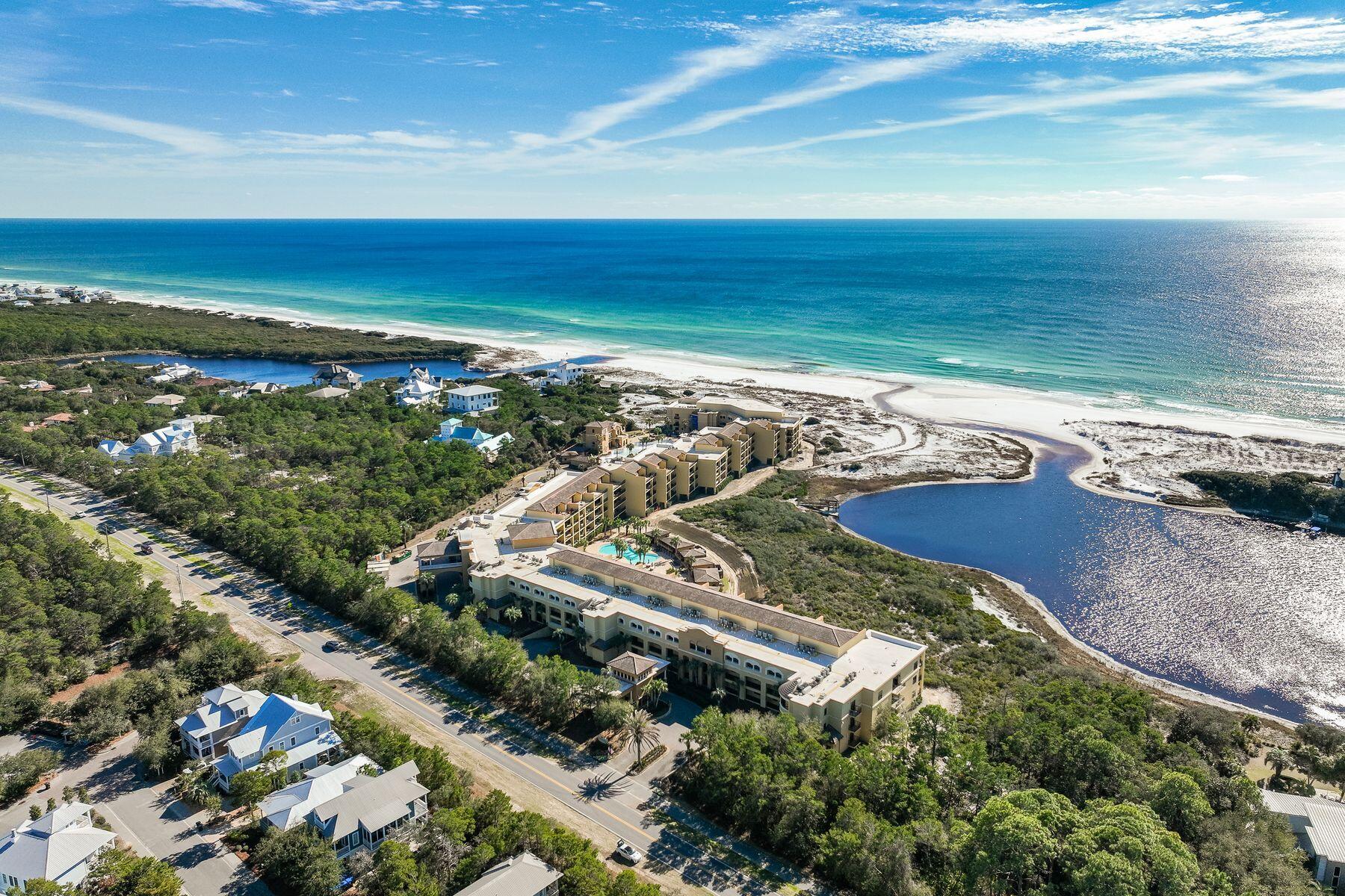 A luxurious beachfront retreat, this elegant condo offers custom finishes, pristine amenities, and breathtaking views of the Gulf of Mexico and Big Redfish Coastal Dune Lake. This top-floor condo provides 3,169 square feet of living space with an open floor plan and four spacious suites. Thoughtfully designed, interior finishes include travertine flooring and high-end furnishings throughout. The first level offers two spacious guest room with ensuite bathrooms. Perfect for those who love to cook, a spacious chef's kitchen features ample cabinetry, a large center island, granite countertops, and Viking appliances. Enjoy casual meals from the breakfast bar while a large dining area is ideal for gathering with family and friends. A large wet bar featuring a beverage cooler adds convenience. The primary-level master suite offers a waterfront oasis with balcony access, dual walk-in master closets, a double-vanity ensuite with a jetted tub and walk-in shower. Natural light streams through sliding glass doors, which also provide inspiring water views that can be enjoyed from several areas of the condo.

The second level is dedicated to an additional luxurious master suite with a generously-sized balcony offering top-floor views of the Gulf of Mexico and Big Redfish Lake. While the first-level balcony offers plenty of space to host meals and enjoy morning coffee, while the second-level balcony offers expansive space to lounge under the sun or enjoy a sunset cocktail.  Additional exterior storage closets add the many conveniences of this property.

A gated community, Sanctuary by the Sea provides 23 acres of carefree beach living in a coveted 30A location. Residents enjoy access to several exquisite amenities, including three swimming pools, spas, gas fire pits and poolside grills along with full-time security. Also included is access to the owner's clubhouse, which features a gourmet kitchen, theater room, virtual golf, and a state-of-the-art fitness center. Enjoy access to a sprawling private beach as well as access to Big Redfish Lake from the convenient community dock for kayaking and paddle boarding. The shopping, dining and entertainment of nearby Blue Mountain Beach, Gulf Place, Grayton Beach and Seaside are just a short ride away along Scenic Highway 30A.