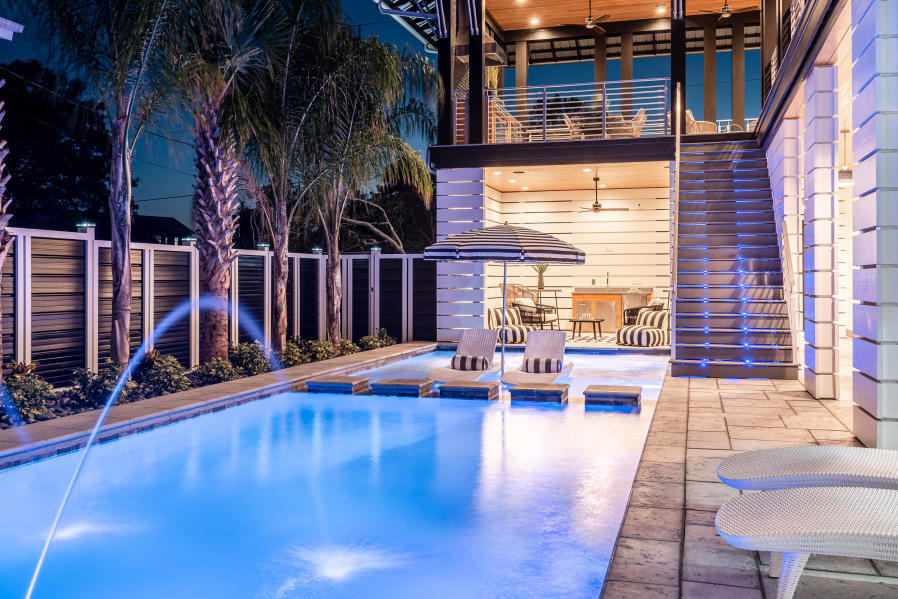 With rental projections up to $505,000, Come Fall in Love with this fully furnished amazing home on the west side of 30A! This ICONIC home offers gulf views, lake views, and a stunning private pool. 
This house is a true one of a kind! The uniqueness of this 7 bedroom/8 bath home will leave you in awe! Professionally designed with every detail accounted for. 
Courtyard entrance greets you with tranquility! Unwind and relax as you see and hear the flow of fountains and bubbles from the amazing pool and spa.. Enter the home and immediately fall in love with the featured art wall. Featuring open concept gourmet kitchen with wolf range appliances, 12 ft long custom made dining table by local Luke Langford, floor to ceiling concrete fireplace room, 2 master suites, 2 bunk rooms, 2 guest rooms each having an on suite, a movie room, 2 laundry rooms, 2 half baths, over size two car garage with heated and cooled owners storage. Multiple porches allow families to spread out and enjoy outdoor living when you aren't at the beach. A grilling porch with outdoor dining, sleeping porch with a fireplace, upper porch with views of Oyster lake and the Gulf and last but not least a pool with sun shelf, fountains and spa with swim up bar seats to enjoy outdoor tv entertainment! This home is sold furnished! The art from artistians Madison Stone, Laurel Galloney, Marisa Silver and Kimberly Tipton-Valentino will also remain with the home. Looking to invest or just call it home, you will not find another one like this on 30A!